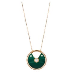 Cartier Collier pendentif Amulette de Cartier en or rose 18 carats, diamants et malachite