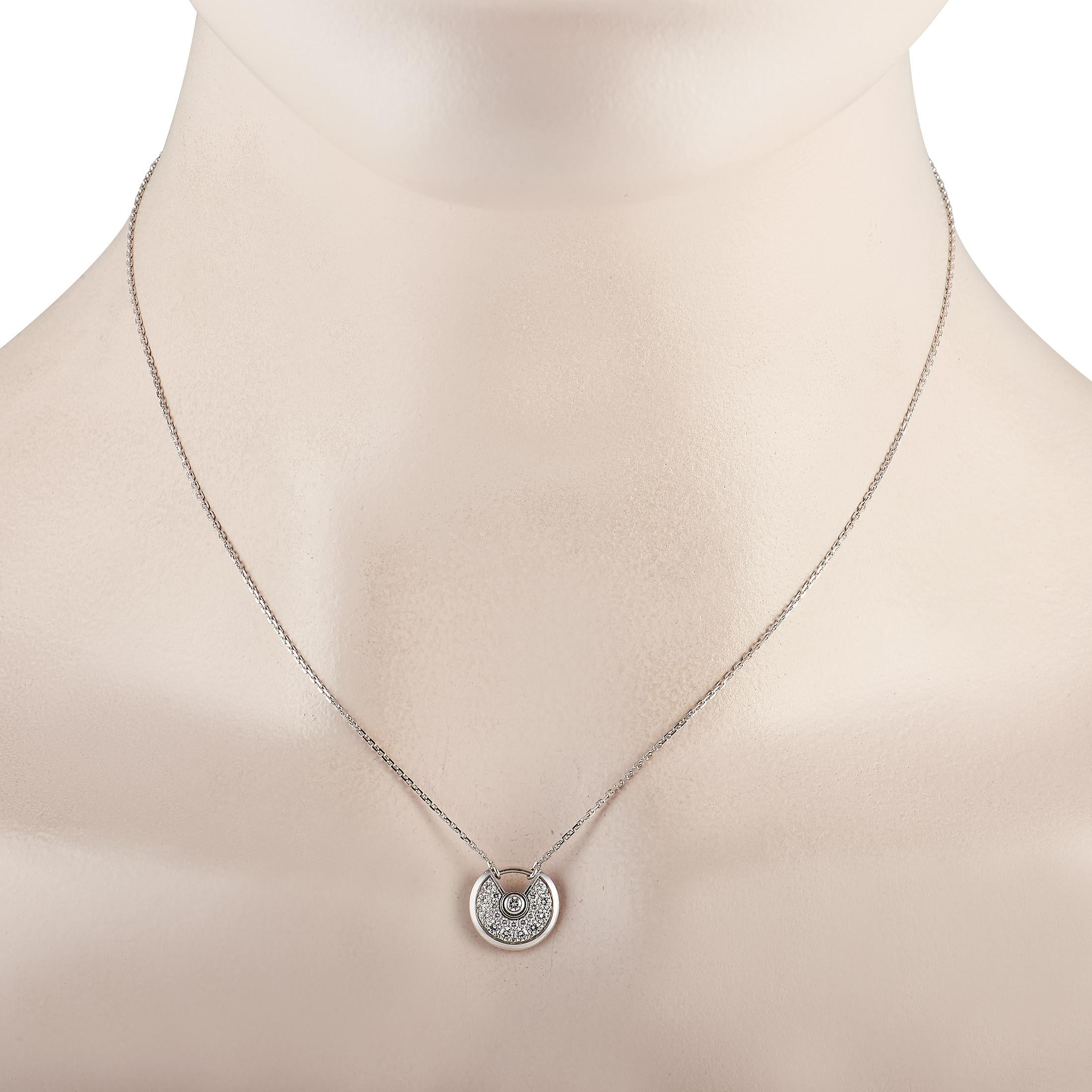 Like all pieces from the Cartier Amulette de Cartier collection, a padlocked-shaped pendant serves as a stunning focal point on this necklace. Suspended at the center of a delicate 16” chain, this piece’s 18K White Gold pendant measures 0.5” round
