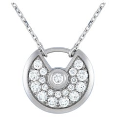 Cartier, collier pendentif Amulette de Cartier en or blanc 18 carats et diamants