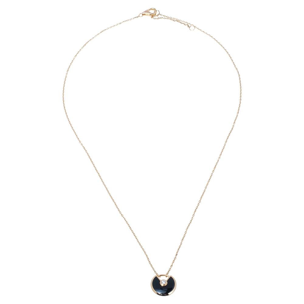 We fell in love with this Cartier necklace at first glance. Look at its gorgeous yet subtle accents and picture how it will beautifully sit on your neck and charm your peers. The exquisite creation is from their Amulette de Cartier collection. It is
