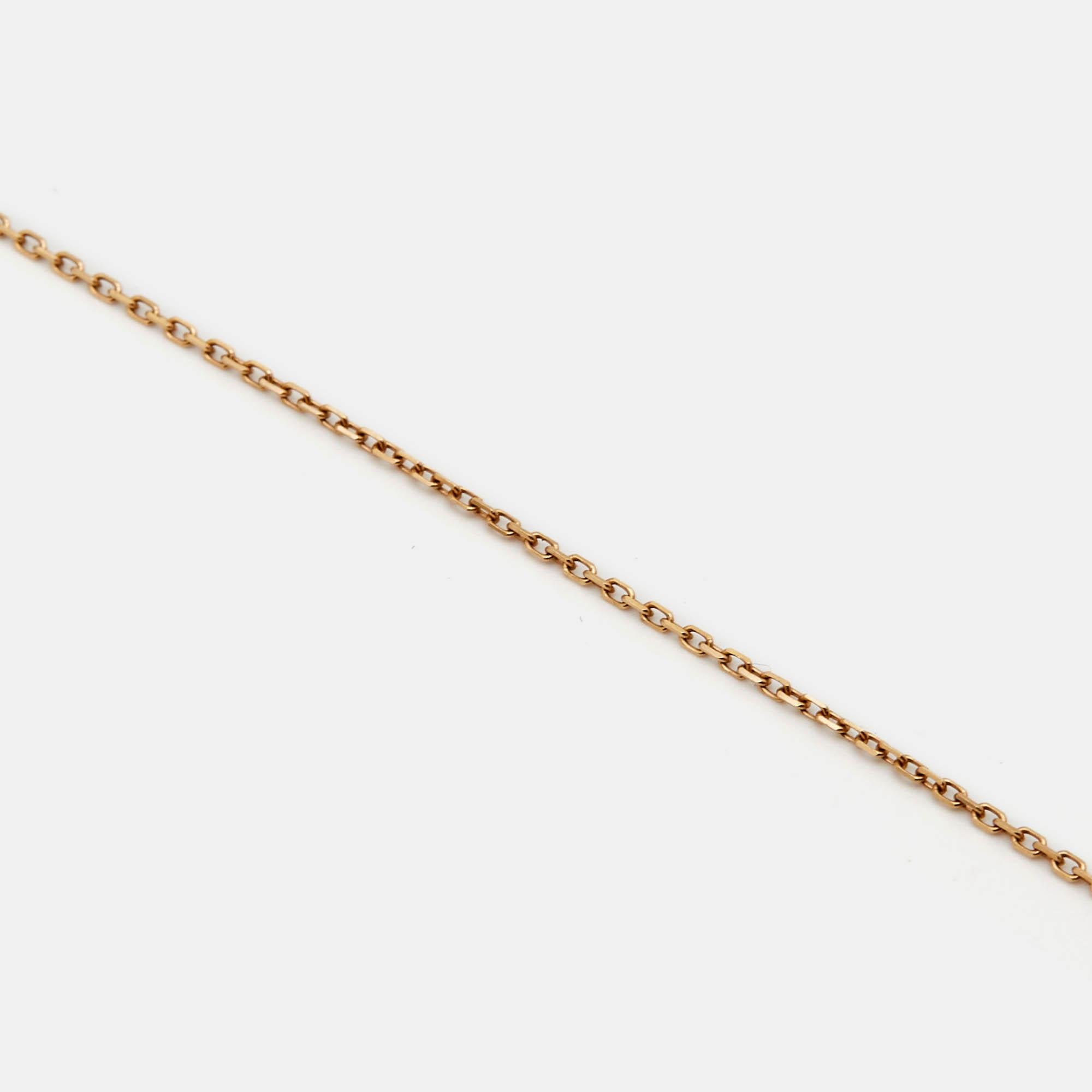 This Amulette de Cartier necklace is subtly elegant as well as beautifully luxurious. Constructed in 18K rose gold, this necklace features a disc charm inlaid with malachite and punctuated with a single diamond.

Includes
Original Case