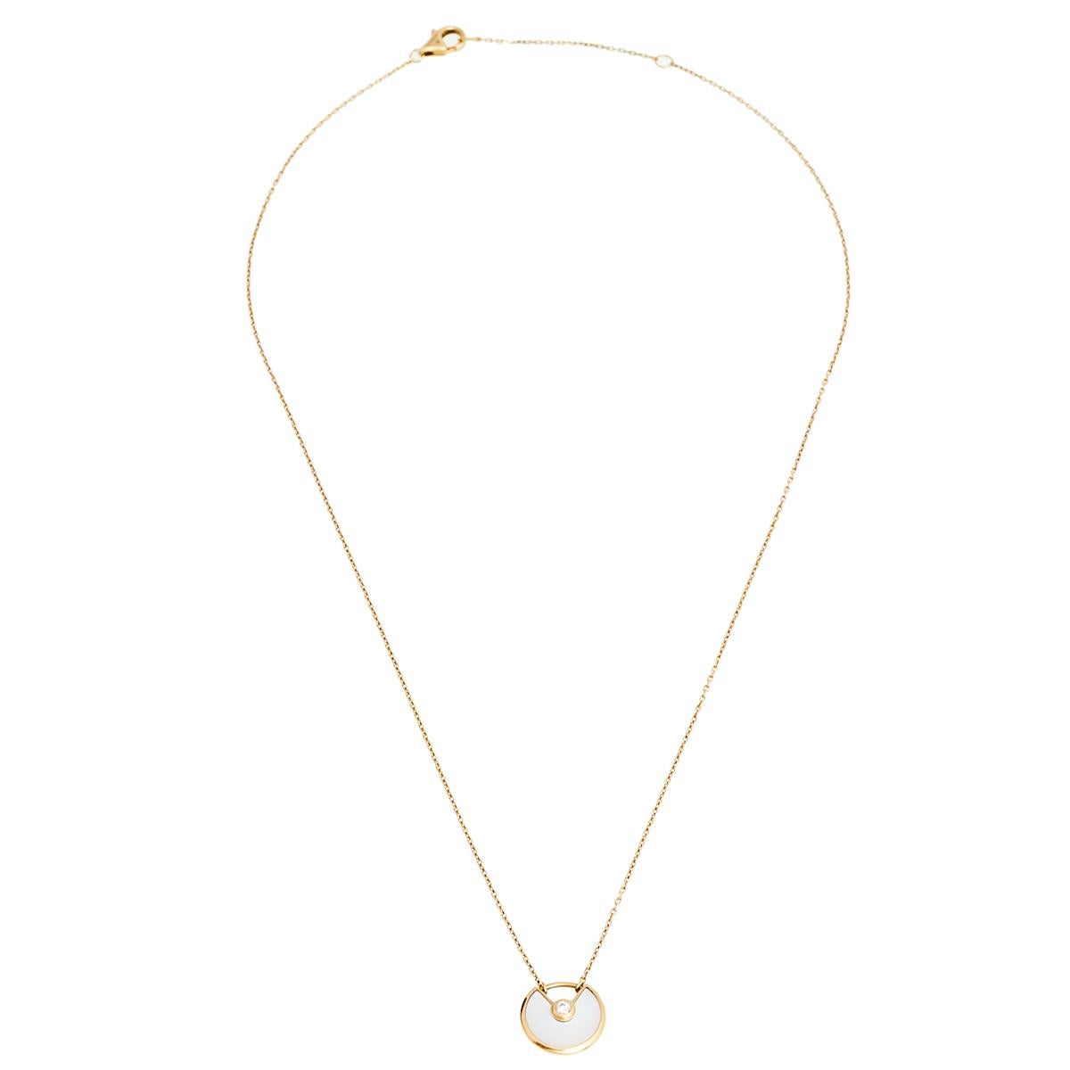 This necklace by Cartier is so pretty, it won't just make you look good but you'll also love having it around your neck. The exquisite creation is from their Amulette de Cartier collection. It is crafted from 18k yellow gold and adorned with a round
