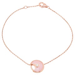 Bracciale Amulette di Cartier con diamanti e Opale rosa