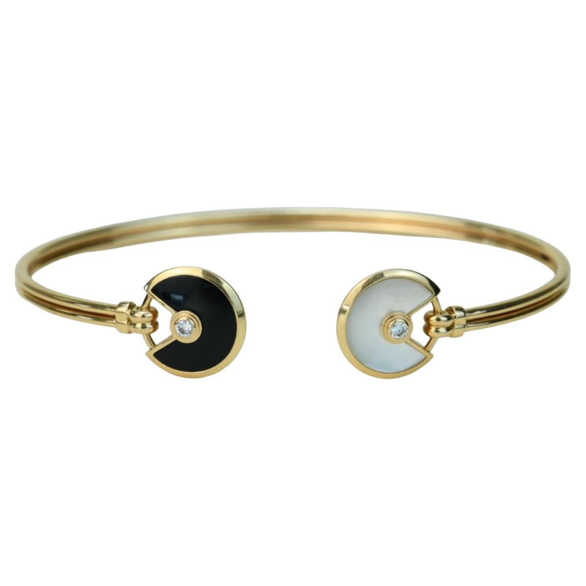 Cartier Amulette Diamond Mother of Pearl and Onyx 18K Yellow Gold Bracelet Size  For Sale
