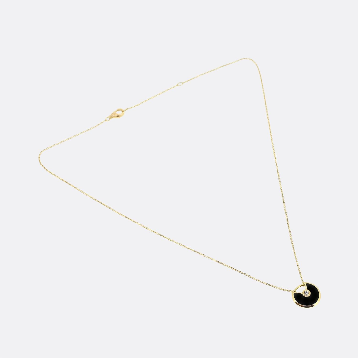 Cartier Amulette Onyx and Diamond Pendant Necklace In Good Condition In London, GB