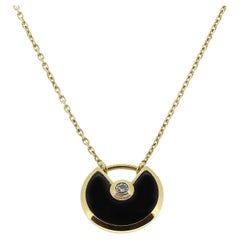 Cartier Amulette Onyx and Diamond Pendant Necklace