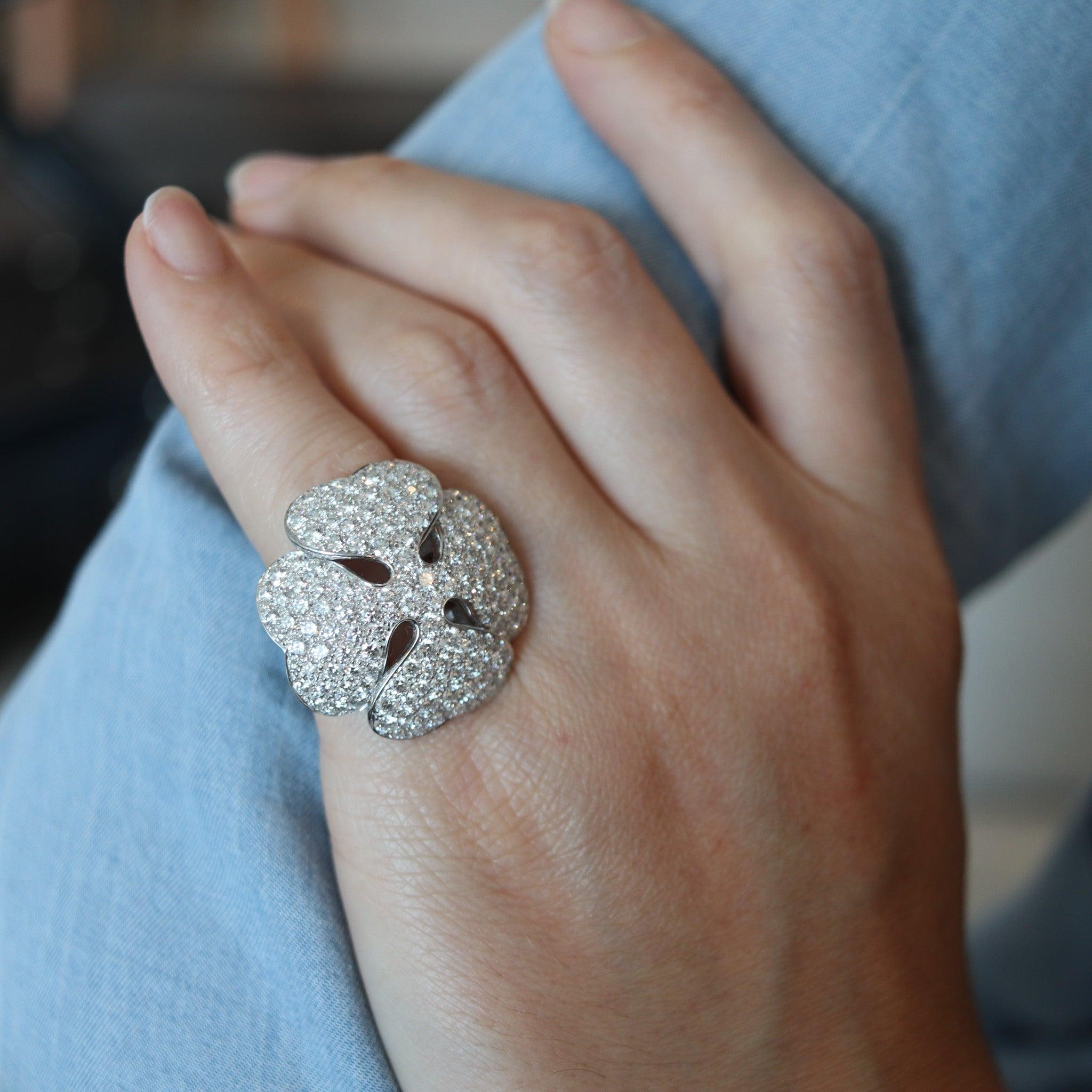 Anniversary clover cocktail ring designed by Cartier.

Very rare cocktail ring, created in Paris France by the famous jewelry house of Cartier, back in the 2008. This iconic ring has been made up in the shape of a big four-leaves clover, crafted in