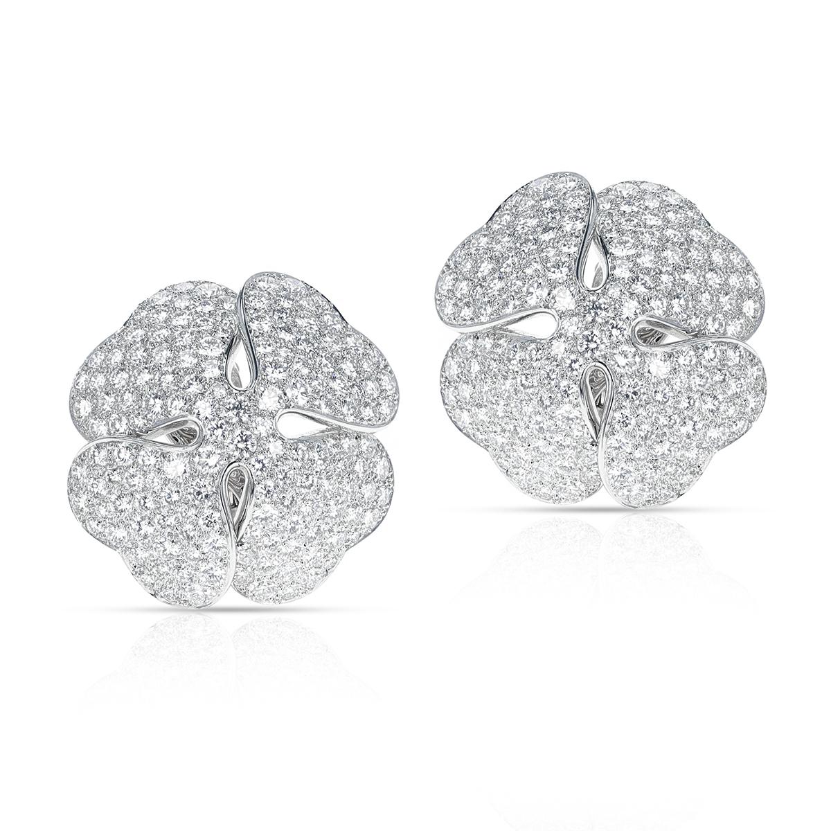 A collector pair of Cartier Anniversary Edition Clover Diamond Earrings. The earring weighs 29.17 grams. Part of Set with Ring. The dimensions of the earring are 1 1/8