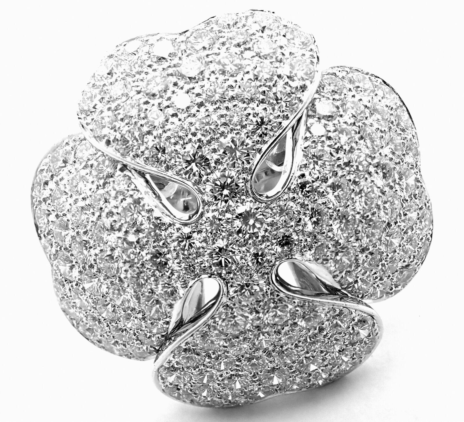 18k White Gold Anniversary Edition Diamond Pave Clover Cocktail Ring by Cartier.  
This is Anniversary edition Cartier ring from year 2001.
With Round brilliant cut diamonds VVS1 clarity, E color total weight approximately 10ct
Details: 
Ring Size: