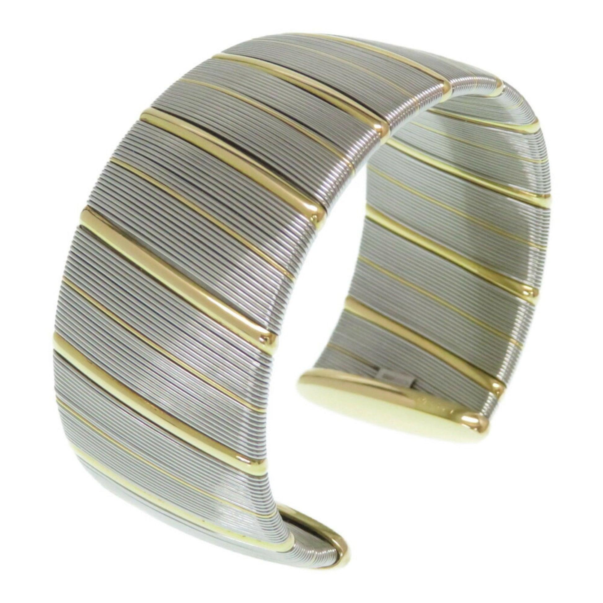 Cartier Antique Bangle in 18K Gold, Silver And Stainless Steel

Additional Information:
Brand: Cartier
Gender: Women
Model: antique
Material: Stainless steel, Yellow gold (18K)
Condition: Good
Condition details: The item has been used and has some