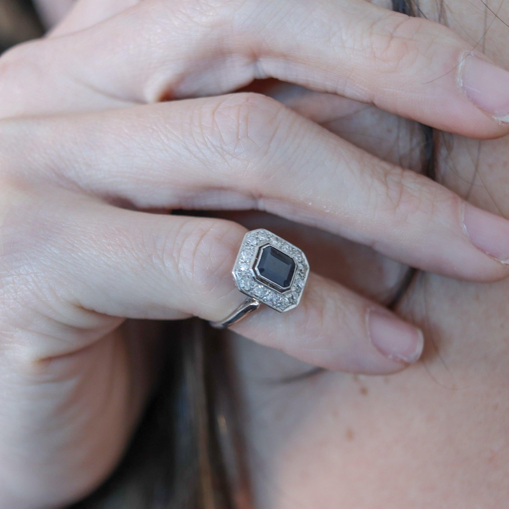 An art deco platinum ring with sapphires designed by Cartier

This is a beautiful antique cocktail ring, created by the French jewelry house of Cartier during the art deco period, back in 1930. The elegant ring was crafted with classic patterns in