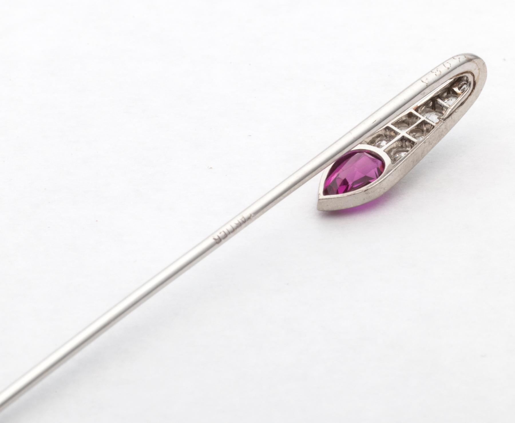 Stick with this pin and your wardrobe will be completely nailed down!  Signed, stamped, and numbered Cartier Paris, circa 1925-30, this stick pin has a beautifully curved silhouette featuring one luscious pear shaped Burmese no heat ruby elegantly