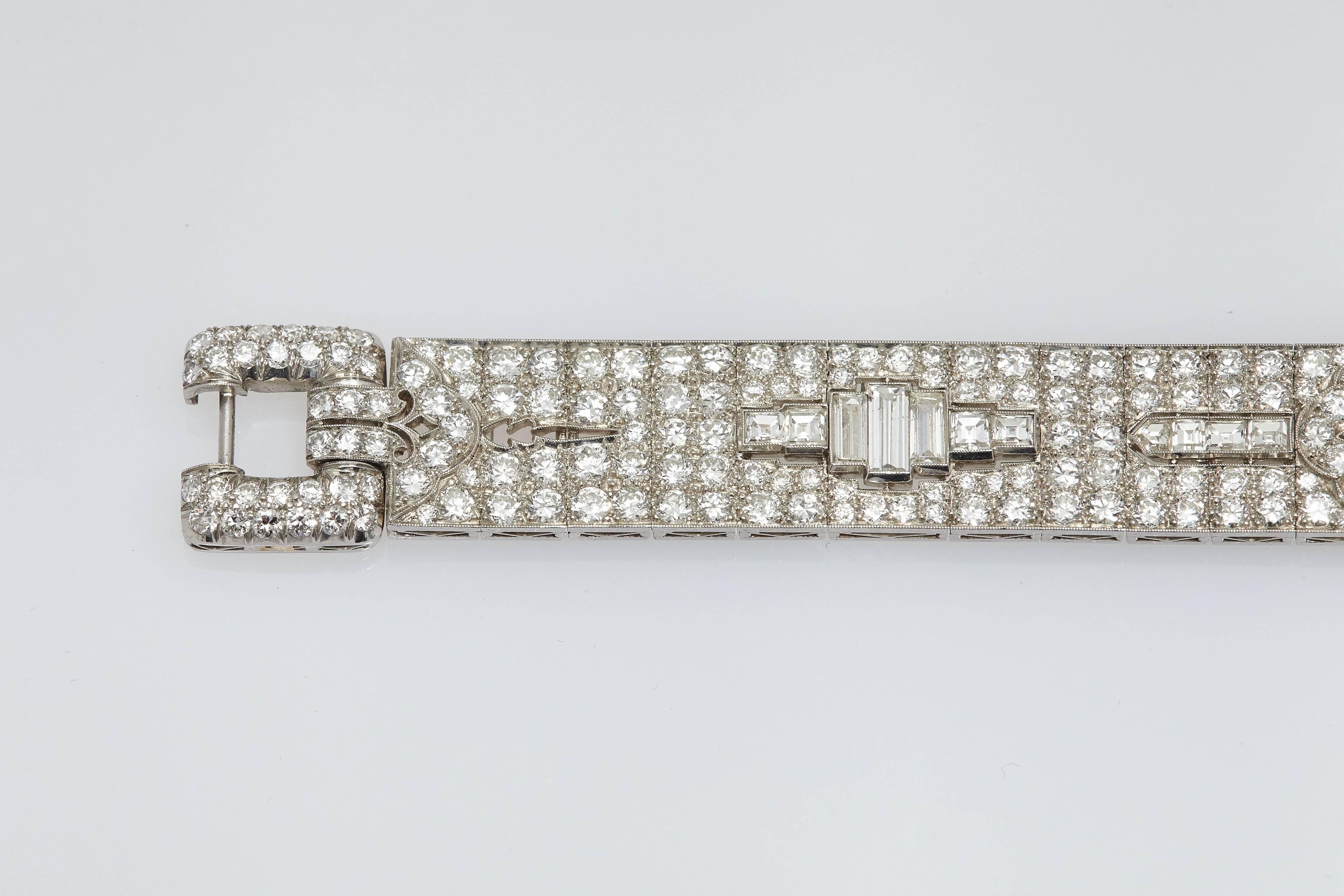 Cartier New York Art Deco articulated platinum bracelet of rectangular and baguette cut diamonds set within pavé old European-cut and single-cut diamonds, mounted on platinum. Made in New York, circa 1925. 