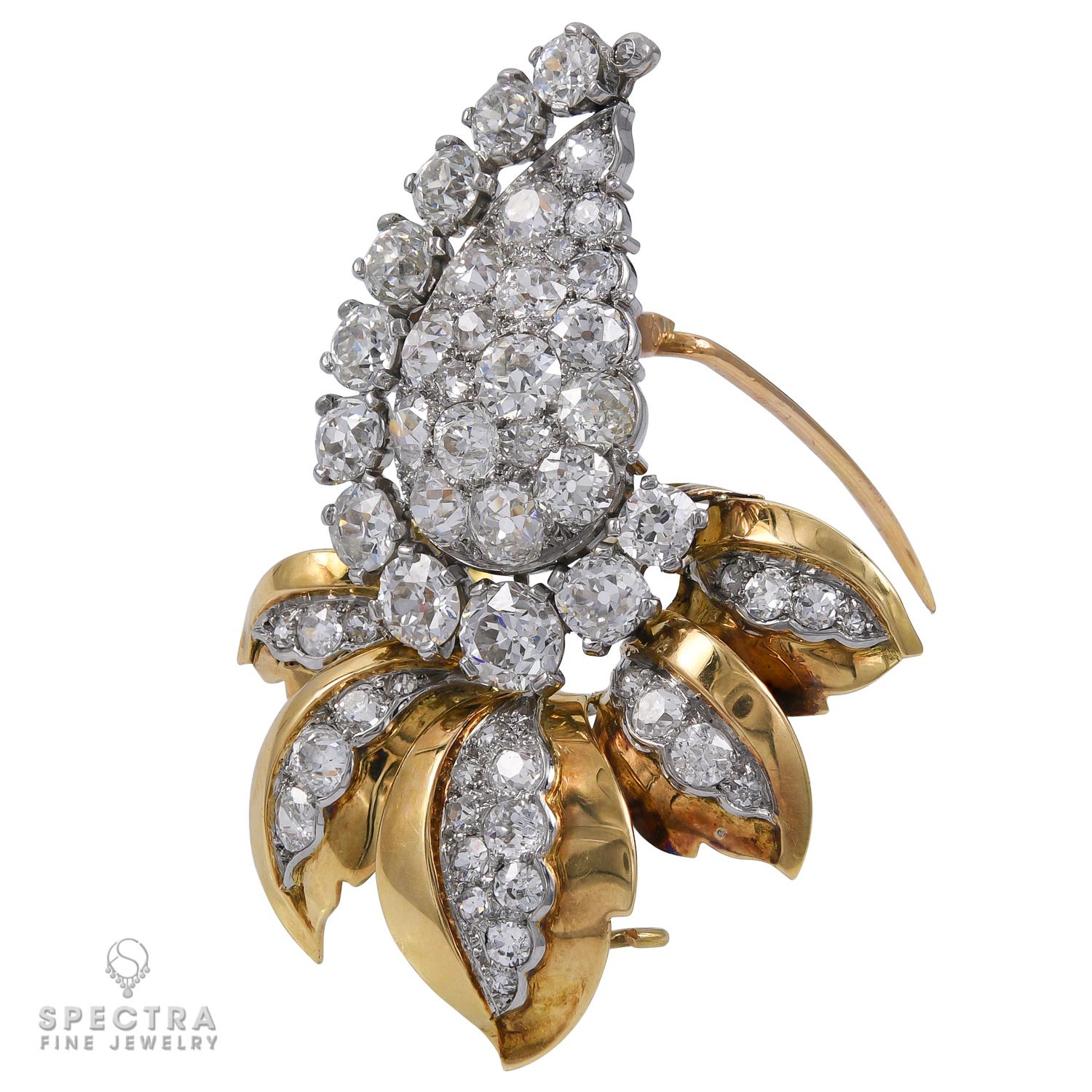 Crafted in 1948 by Charles Jacqueau for Cartier, the exquisite 'Bud & Leaves' brooch is a testament to timeless elegance. Encrusted with diamonds and set in 18k yellow gold, its intricate design captivates the eye. Versatility meets sophistication