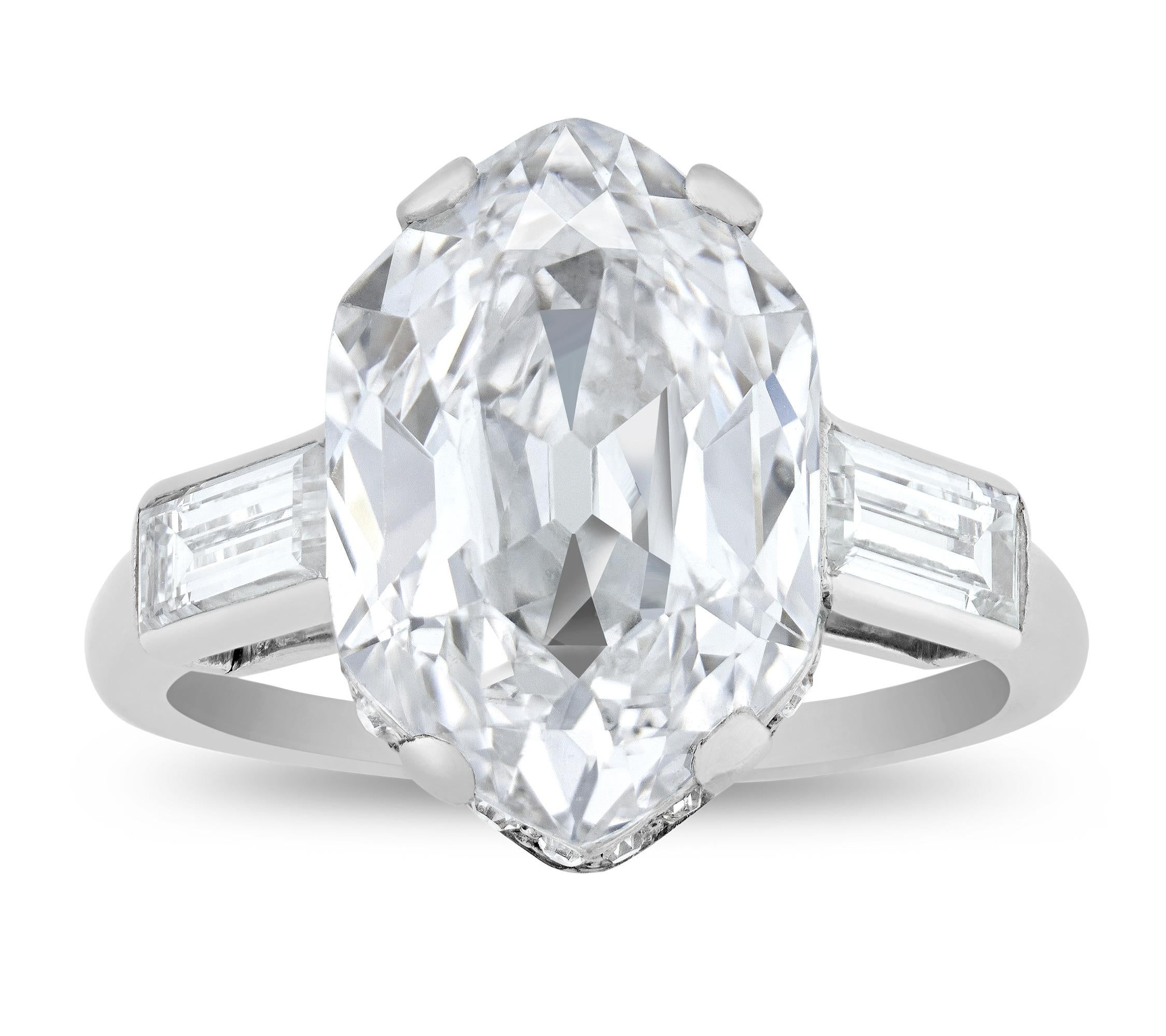 Spectacular color, clarity and rarity distinguish the 4.33-carat diamond in this Art Deco-period ring by famed jeweler Cartier. Unique for its hexagonal shape, the diamond is certified by the Gemological Institute of America as a type IIa diamond,