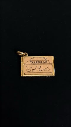 Cartier Art Deco Gold "Telegram" Charm Pendant Gold 18k France circa 1925