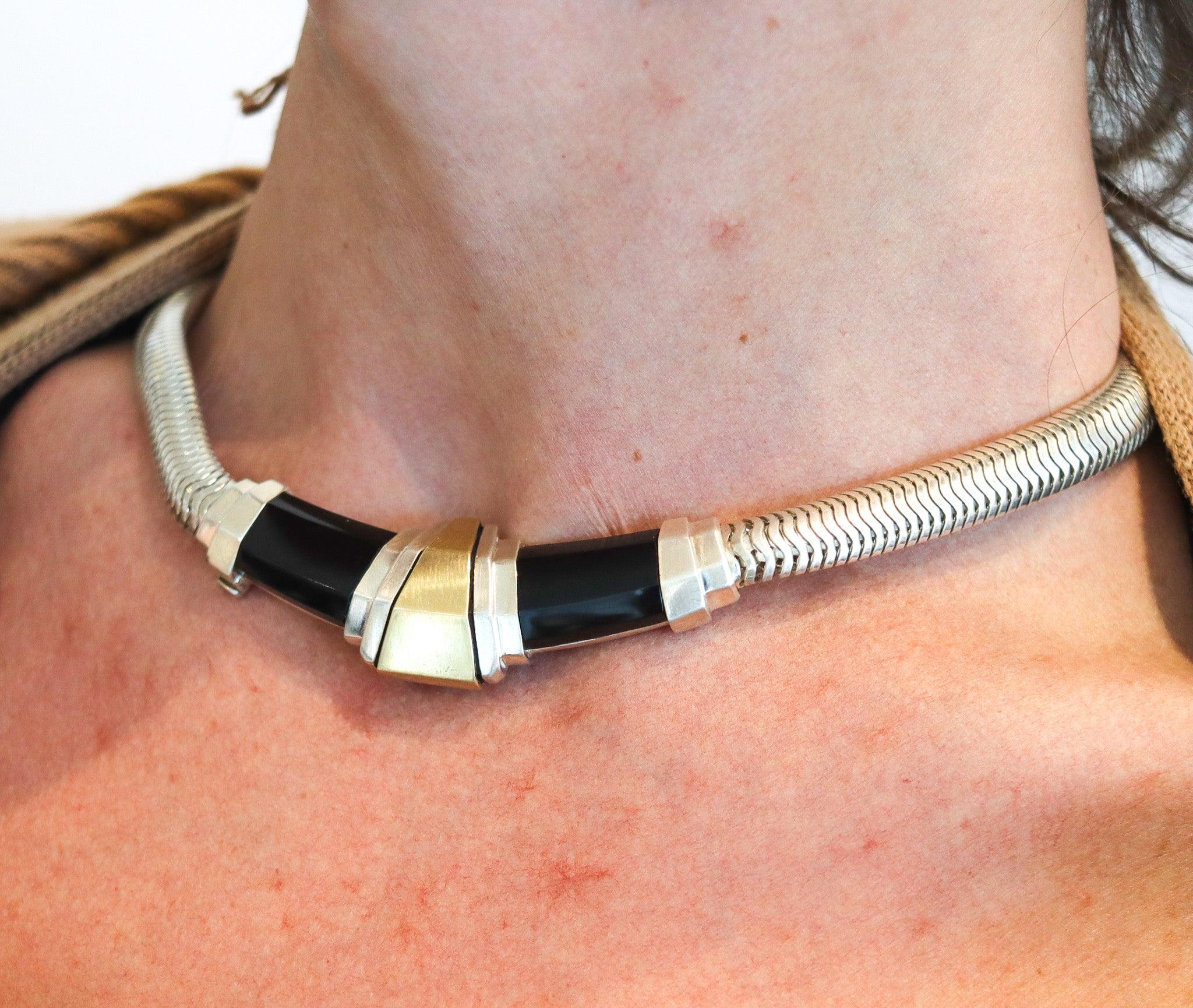 An art deco geometric necklace designed by Cartier.

This is an art-deco geometric necklace created in France by the jewelry house of Cartier, back in 1968-1970. The necklace has been crafted as a flexible tubogas thick chain in solid .925/.999