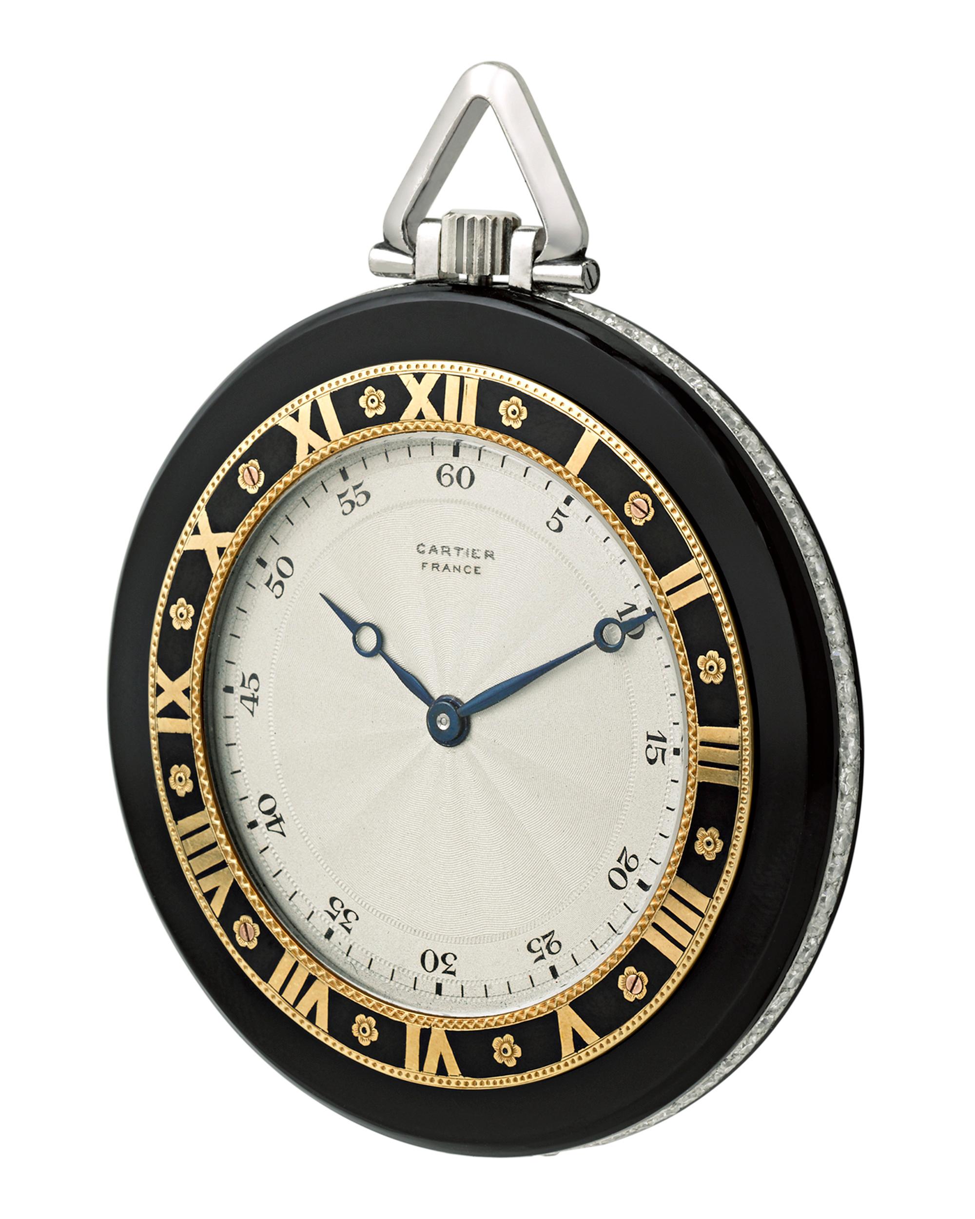 A study in classic Art Deco design, this pocket watch by Cartier is in a class all its own. The open face timepiece is housed in a sleek ultra-flat case crafted from onyx with a platinum case-band. Embedded in the platinum is a row of dazzling