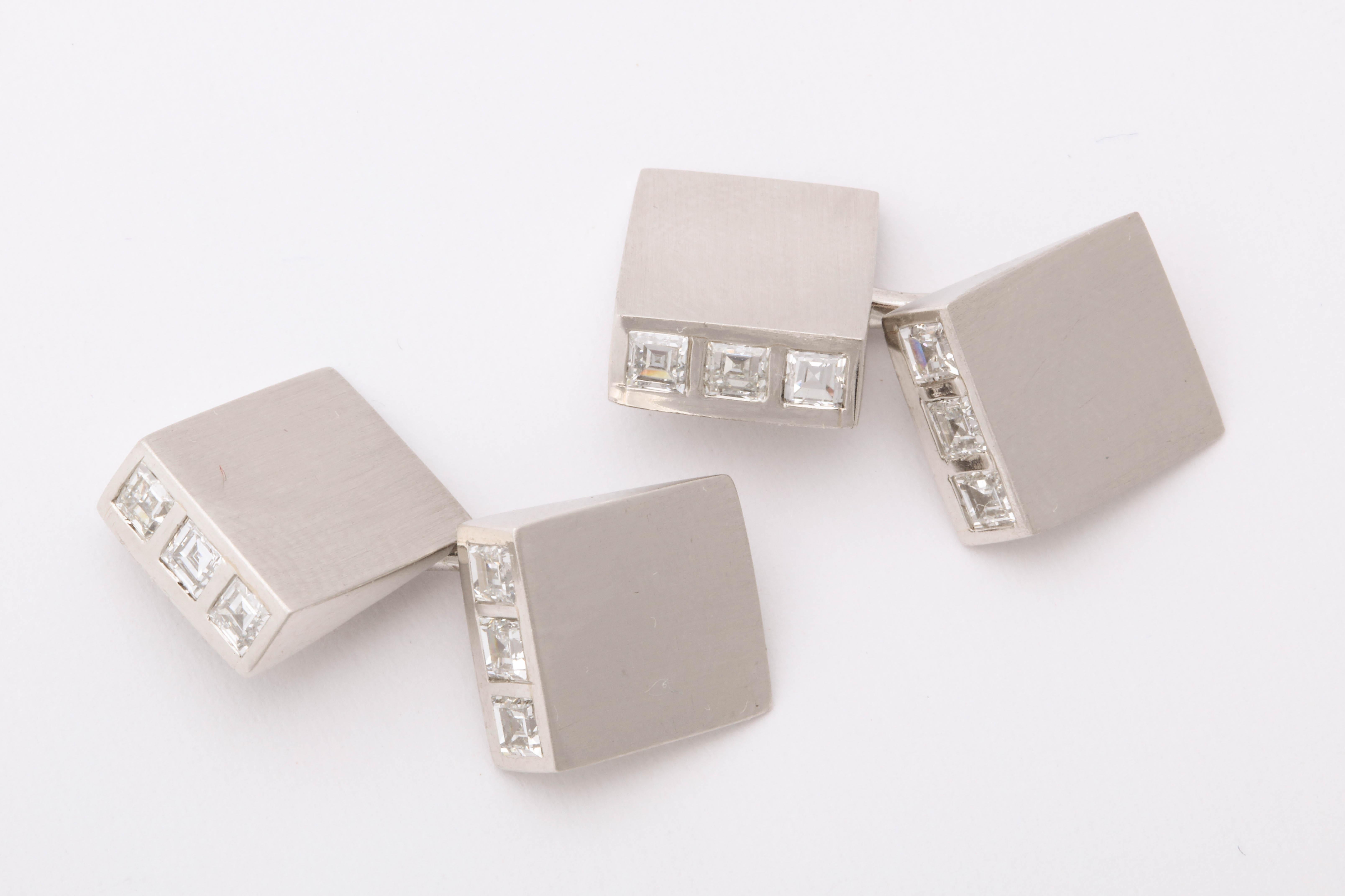 Platinum cufflinks, each link set with 3 diamonds for a total of 12 diamonds. In original box. Made by Cartier.