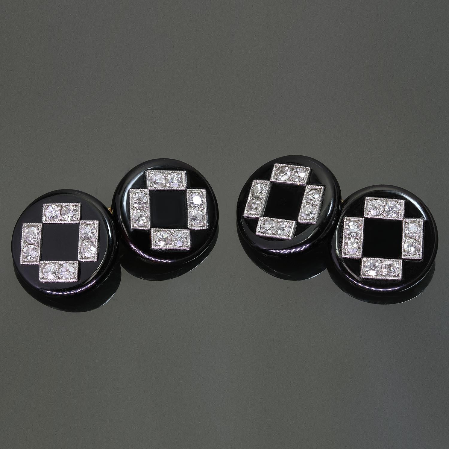 These exquisite Cartier Art Deco round cufflinks are crafted in platinum and black onyx and set with old mine-cut G-H VS1-VS2 diamonds weighing an estimated 0.60 carats. Made in France circa 1915 - 1920. Signed and Numbered.  Measurements: 0.55