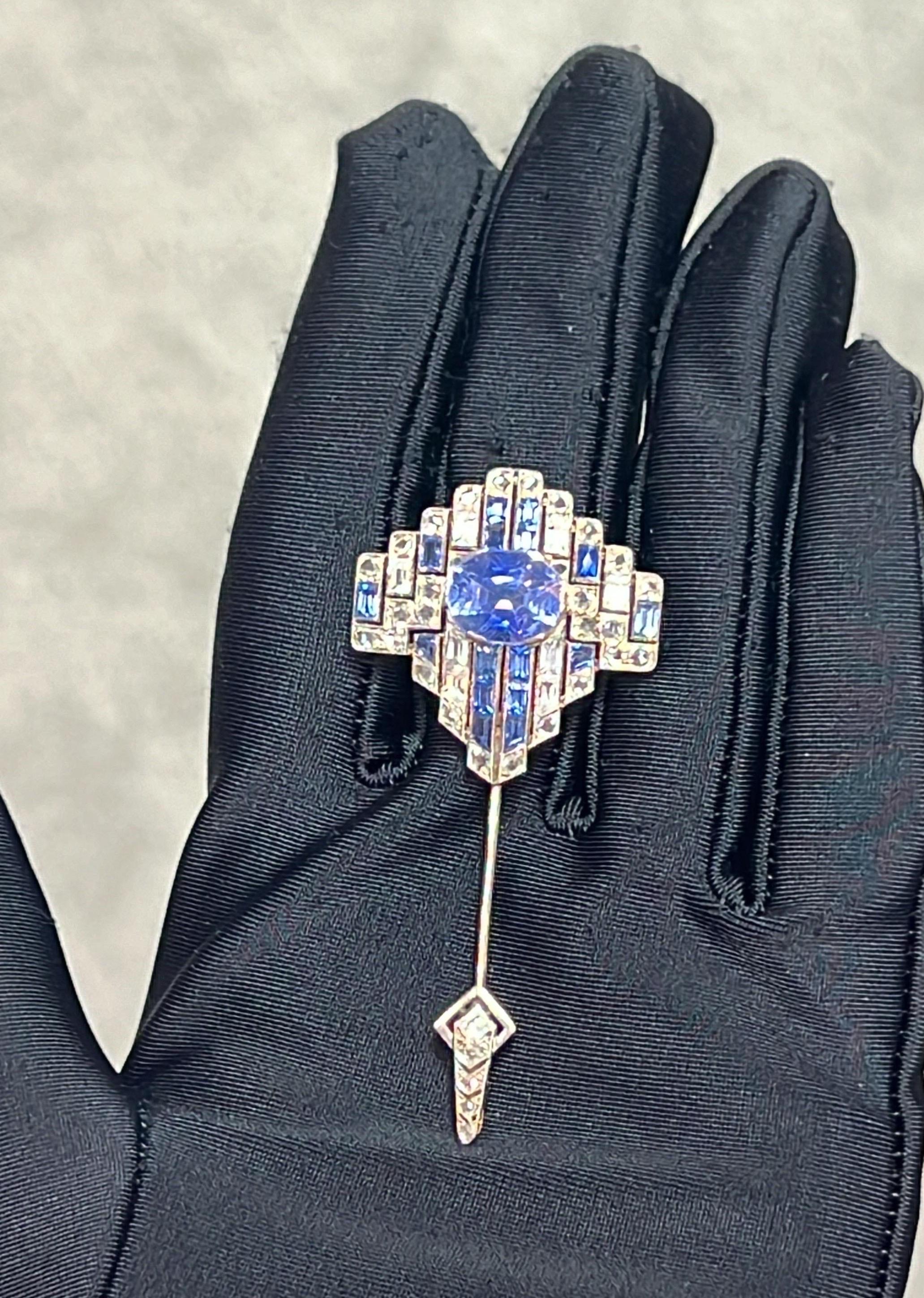Cartier Art Deco Sapphire Jabot Brooch

A Cartier brooch featuring a center oval-shaped sapphire, accented with rectangle-cut sapphires and baguette and rose-cut diamonds.

Approximate length: 2.5