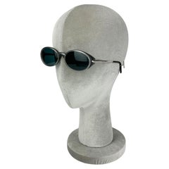 Occhiali da sole ovali Cartier Aspen vintage grigio anni '90 ca.