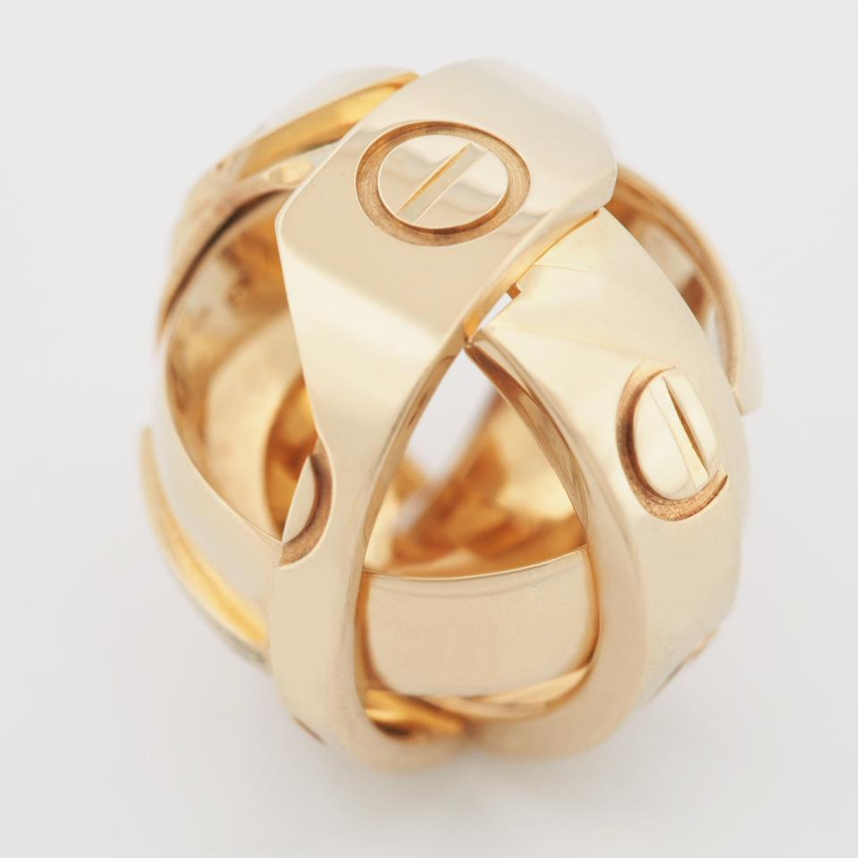 Item: Authentic Cartier Astro Love Ring ( 1999 Limited Edition )
Stones: ---
Metal: 18K Yellow Gold
Ring Size: 51 US SIZE 5.5 UK SIZE K 1/2
Internal Diameter:  16.25 mm
Measurement:  6.96 mm width
Weight:  12.0 Grams
Condition: Used