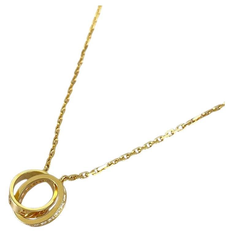 Collar Cartier Baby Love de oro amarillo de 18 quilates con pavé de diamantes entrelazados en venta