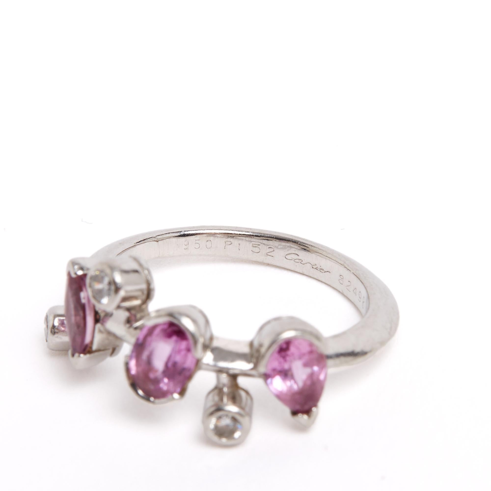 Cartier Meli Melo model ring in platinum adorned with marquise, oval and pear-shaped pink sapphires, for a total of approximately 1.10 ct, and 3 round brilliant-cut diamonds, for a total of approximately 0.15 ct, set at the front in a scattered