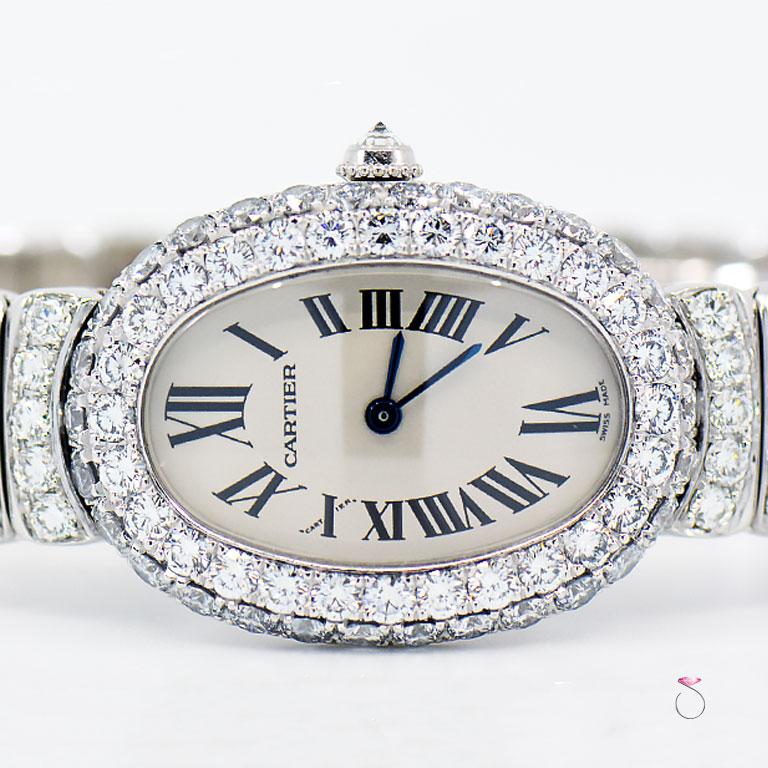 100% All Original, Extremely rare and Magnificent ladies Cartier Baignoire full diamond watch in 18K white gold. This gorgeous watch features the oval baignoire case in 18k white gold set with two rows of large diamonds covering the case, the 58