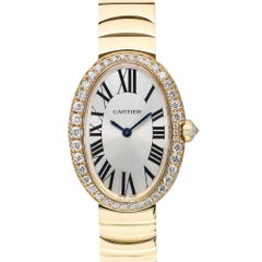 Cartier Montre Baignoire à quartz en or jaune 18 carats avec cadran en argent et diamants WB520019