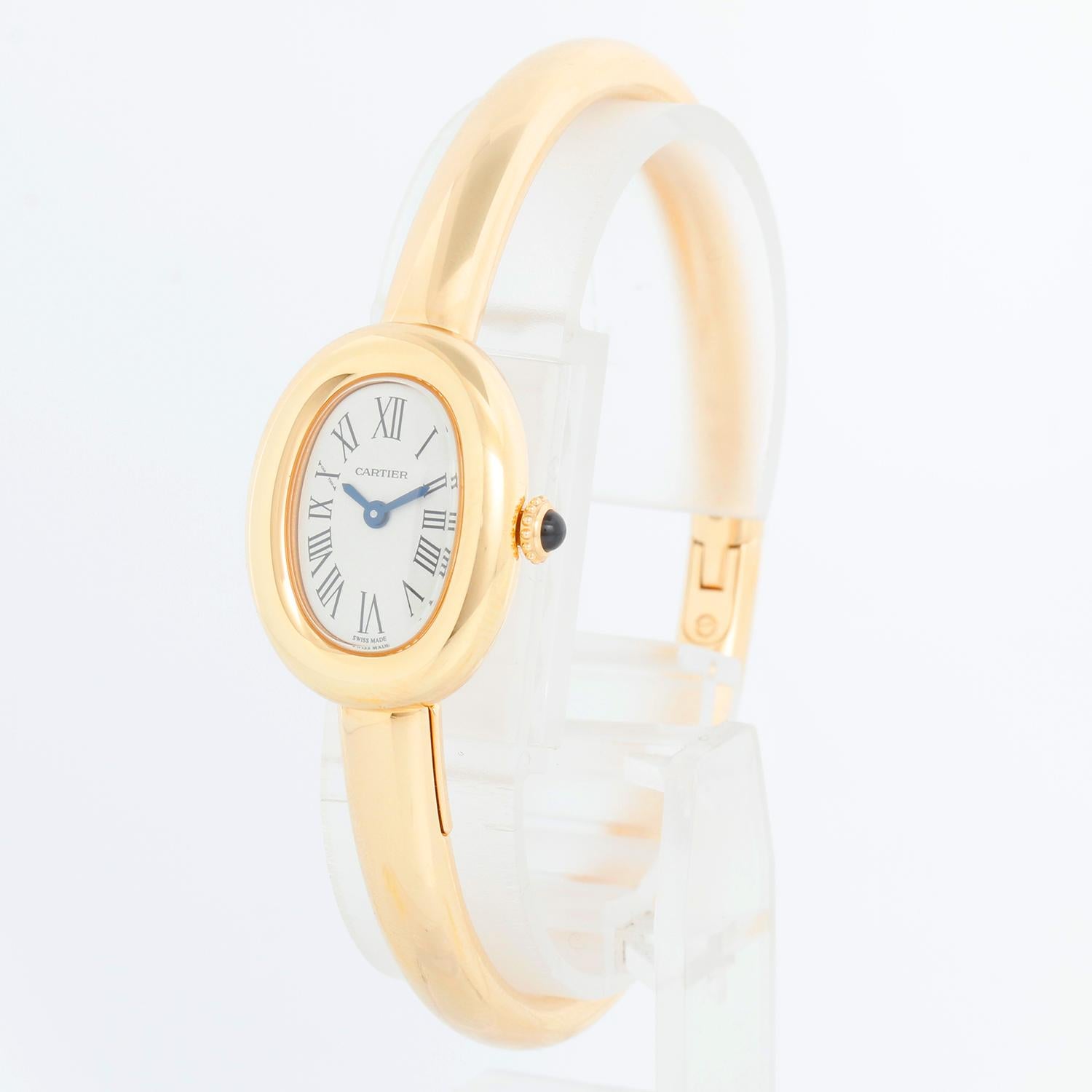 Cartier Baignoire 18K Yellow Gold Watch WGBA0050 Size 17  - Quartz. 18K Yellow gold (18 mm). Silver dial with blue hands and black Roman numerals. 18K yellow gold bracelet with 18K yellow gold hidden clasp; size 17 . Unused with Cartier box and