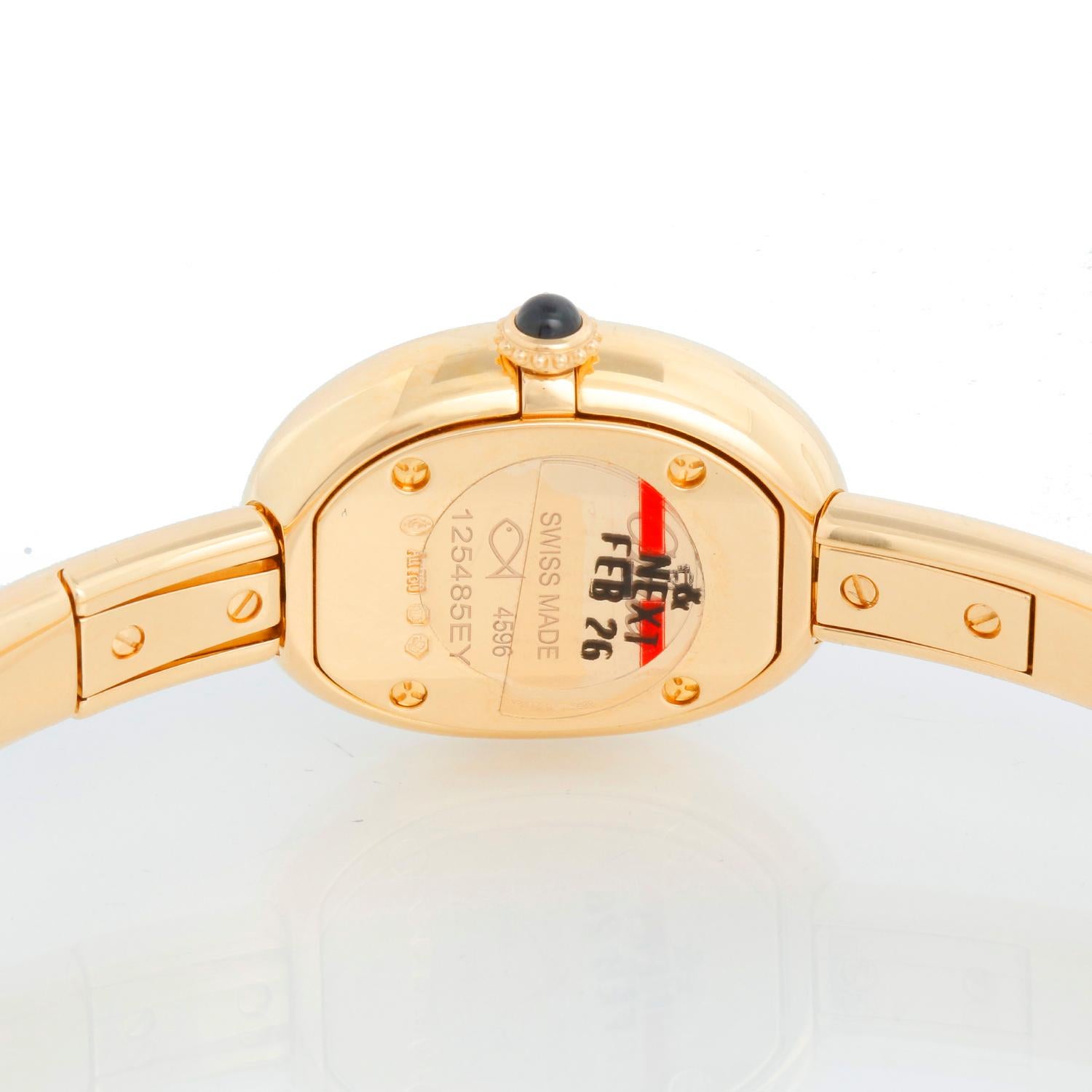 gold bangle watch