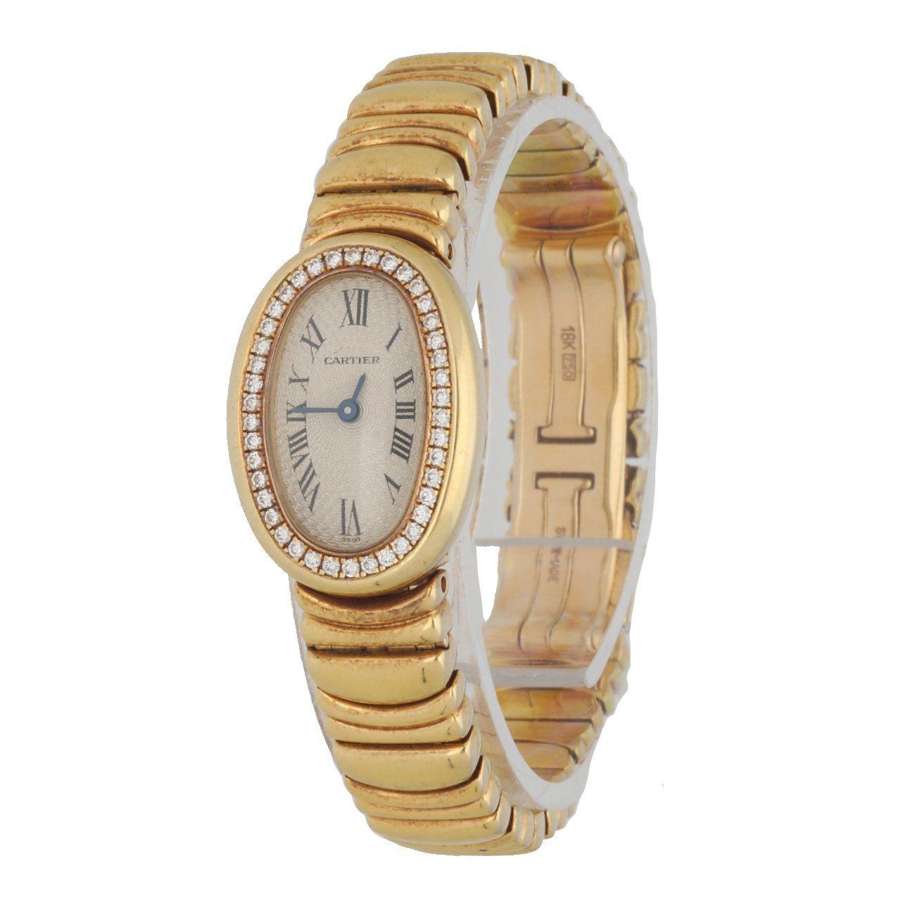 Cartier Baignoire 1960 ladies watch. 22mm 18k Yellow Gold case withÂ 18K Yellow Gold bezel & factory diamonds set. Off-White dial withÂ Blue hands andÂ Black Roman numeral hour markers. 18K Yellow Gold Bracelet with 18K yellow gold Butterfly Clasp.