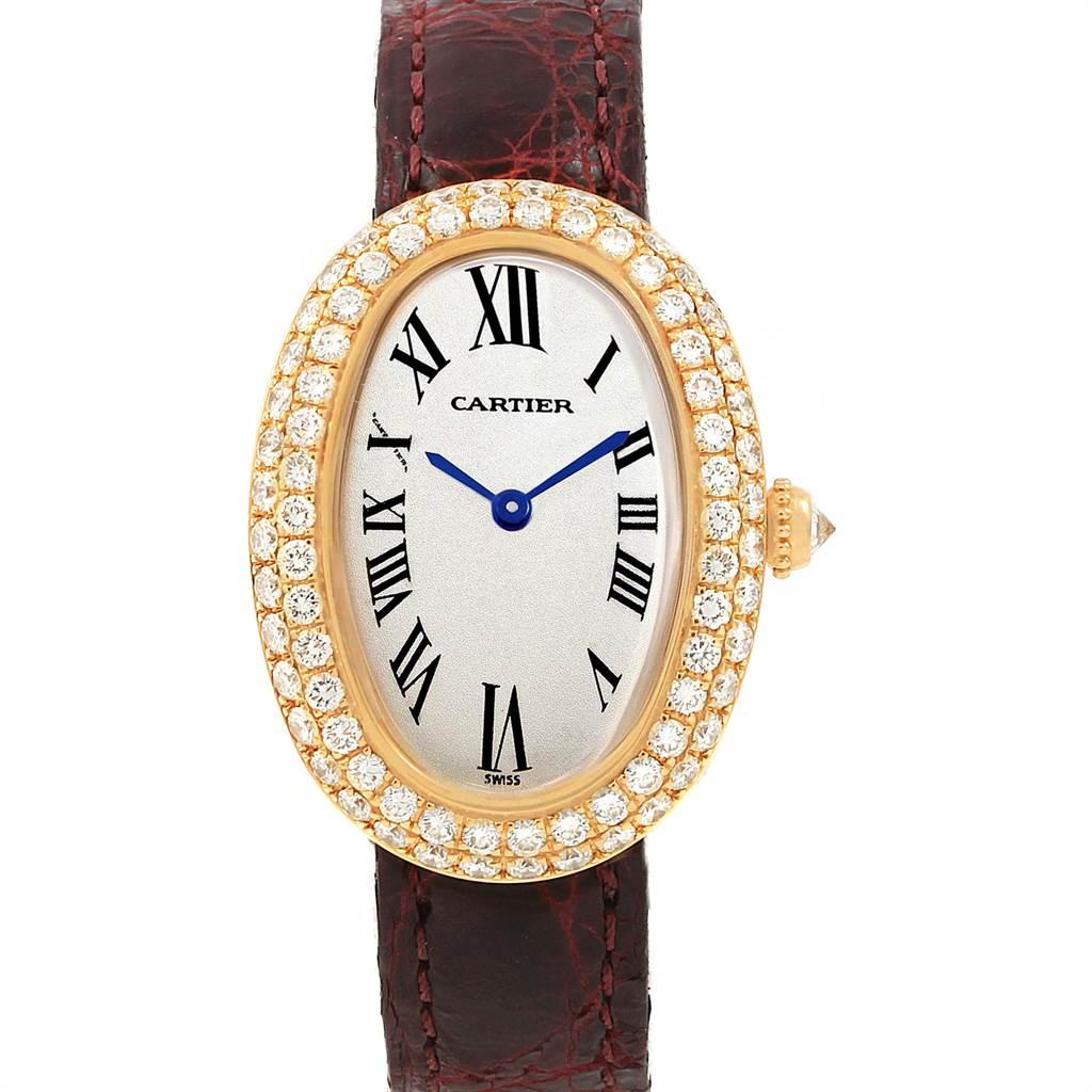 Cartier Baignoire Burgundy Strap Yellow Gold Diamond Ladies Watch 1954. Quartz movement. 18k yellow gold oval case 31.0 x 22.5 mm. Crown set with the diamond. 18k yellow gold 2-row pave-set diamond bezel. Scratch resistant sapphire crystal. Silver