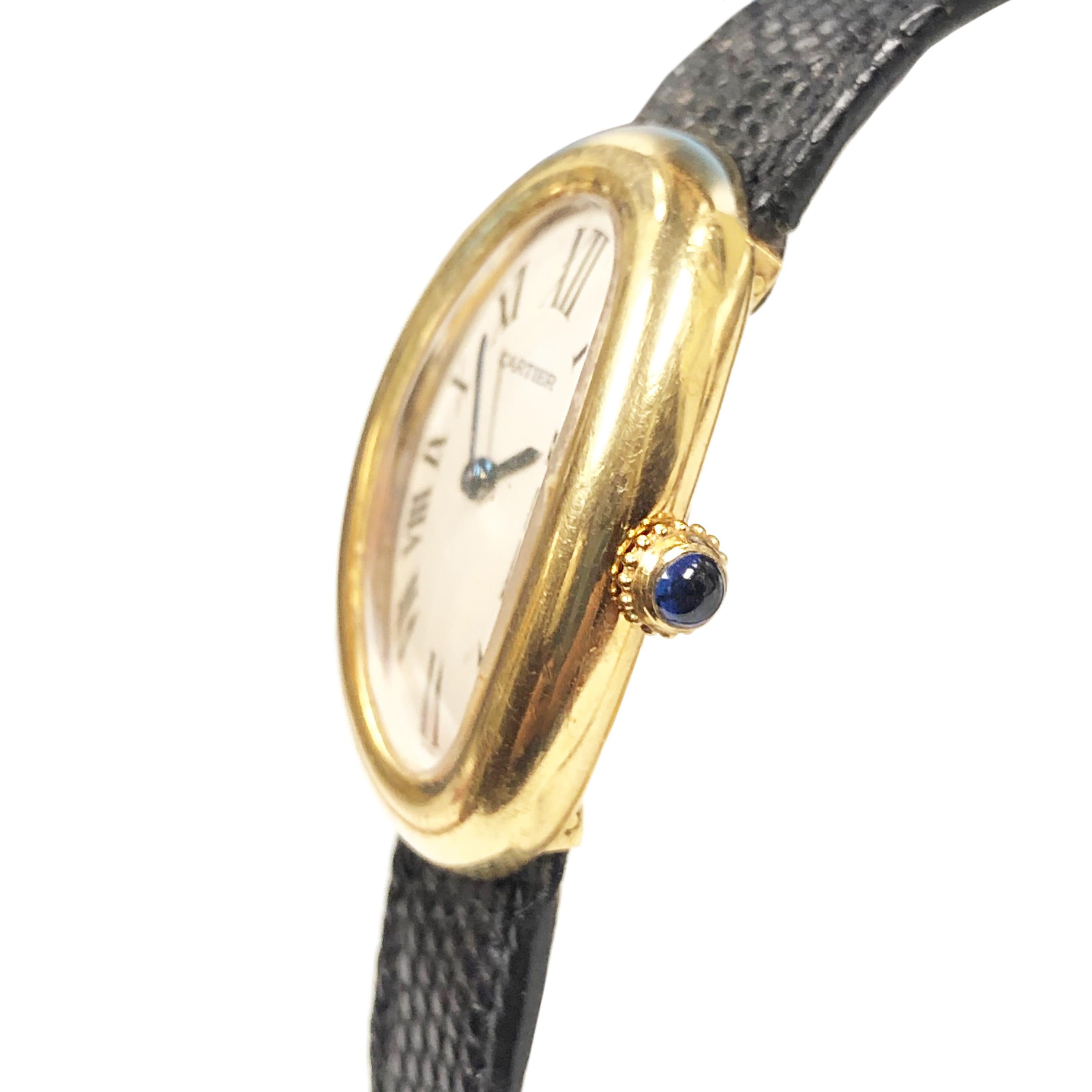 Circa 1980 Cartier Baignoire collection Wrist watch owned and worn by Hollywood Icon Jerry Lewis. 31 X 23 MM 18K Yellow Gold 2 Piece water resistant case. Quartz Movement, White dial with Black Roman numerals. Black Lizard Strap with Gold Plate