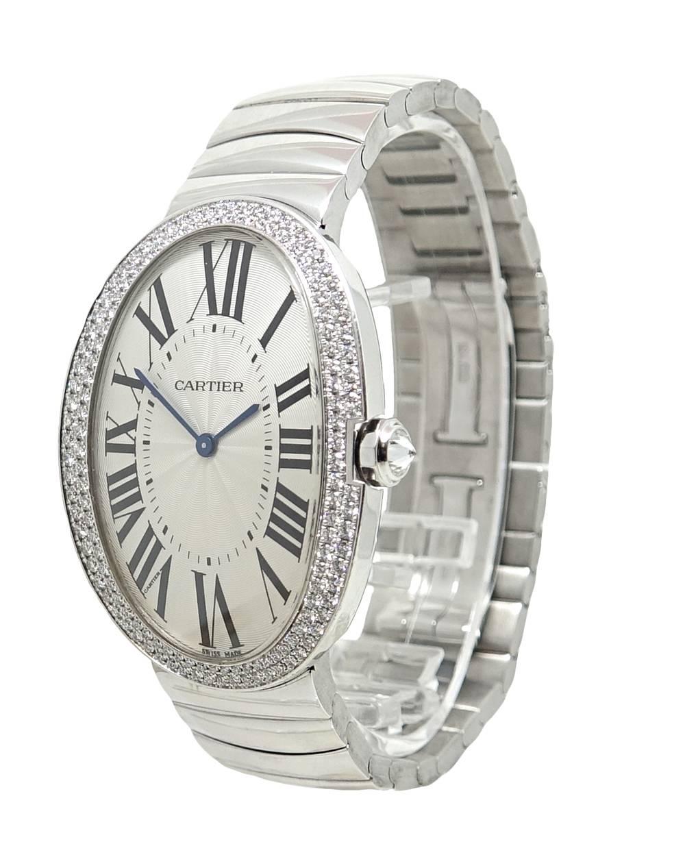 This Classic Cartier Baignoire Watch is 18K White Gold With A Mechanical Quartz Movement and A  Case Size. A Double Row Of Diamonds Along The Bezel Add Sparkle To This Beautiful Cartier. The Size Of This Case Is 44 x 34mm With A Case Thickness Of