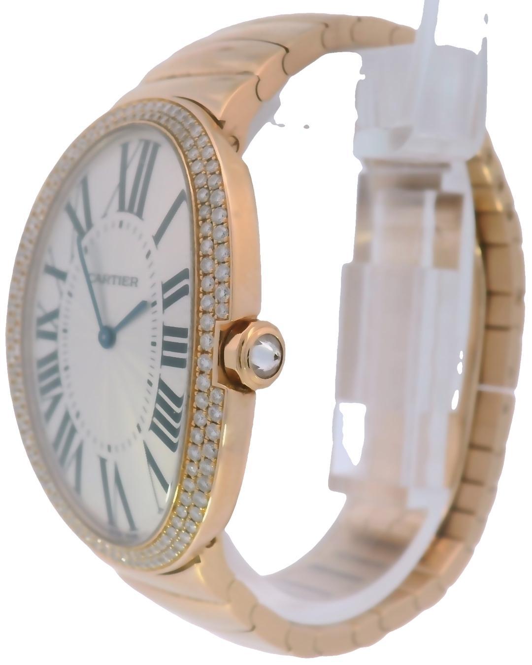 Exuding elegance and sophistication, this exquisite watch features an oval-shaped face adorned with shimmering diamonds encircling the bezel. The dial showcases bold Roman numerals, enhancing its timeless appeal.

A masterpiece of French