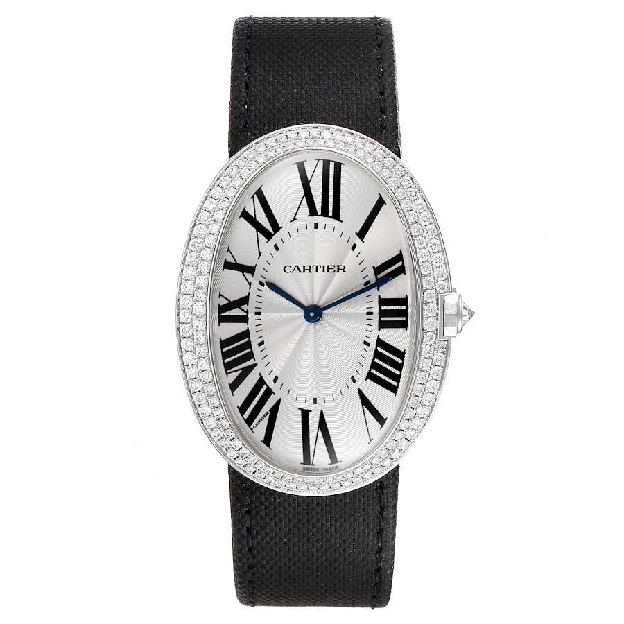 Cartier Baignoire große Weißgold Diamant Damenuhr WB520009. Uhrwerk mit Handaufzug. 18k Weißgold ovales Gehäuse 44 mm x 34 mm. Die Krone ist mit einem Diamanten besetzt. Original Cartier Fabrik Diamant Lünette. Kratzfestes Saphirglas. Silbernes