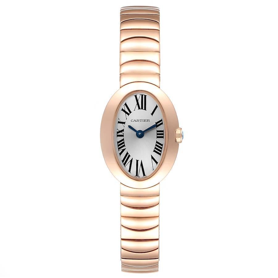 Cartier Baignoire Mini 18K Rose Gold Ladies Watch W8000015 Box Papers. Quartz movement. 18k rose gold oval case 5.30 mm x 20.63 mm. Case thickness: 7.73 mm. The crown set with faceted blue sapphire. 18k rose gold bezel. Scratch resistant sapphire