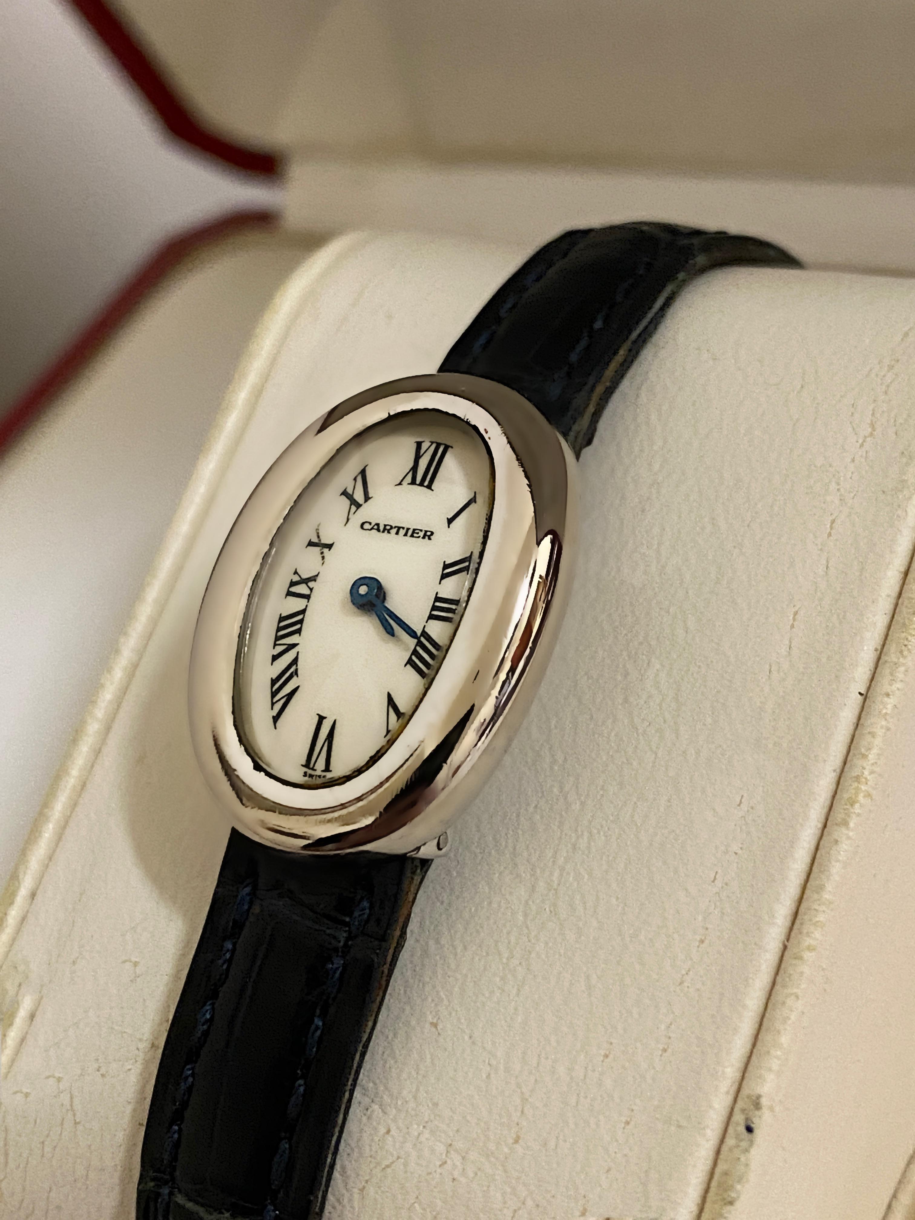 An elegant & timeless Cartier Baignoire Mini reference 2369

is a rarely seen & sought after ladies' timepiece, 

~~~~~~

It features 18K White Gold Oval Case - that's perfectly proportioned, measuring 25mm x 17mm; 

signed & numbered: ref 2369,
