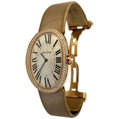 Montre "Baignoire" de Cartier:: grand modèle en or rose et diamants