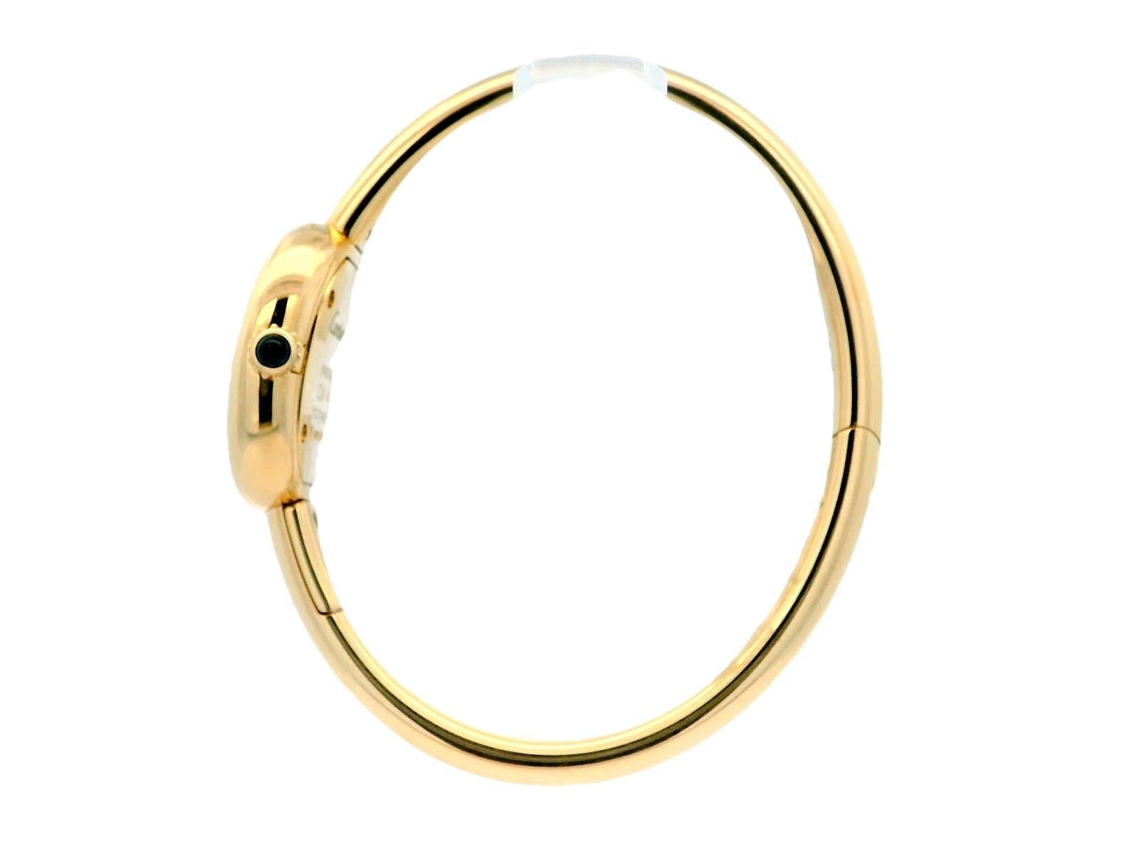 The Cartier Baignoire Ladies Watch is an elegant timepiece designed for sophistication and style. It features a compact 18.7mm case made of luxurious 18K yellow gold, which adds a touch of opulence. The silver dial is beautifully complemented by