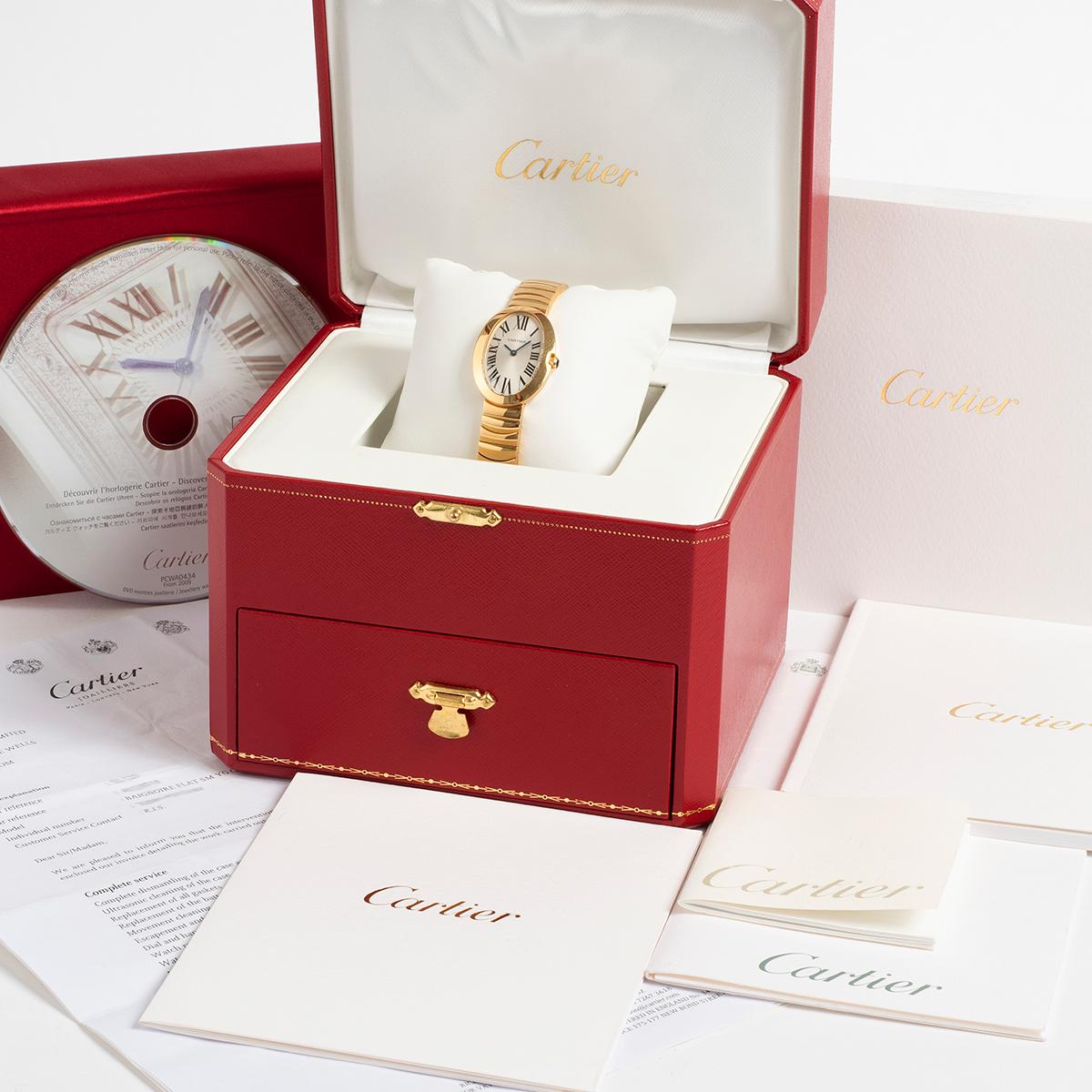 Our iconic and very rare ladies Cartier Baignoire, reference 3208 W800008 features an 18k yellow gold case of 24.6mm x 31.7mm with 18k yellow gold bracelet. Presented in outstanding condition with only light signs of use from new, this wonderful