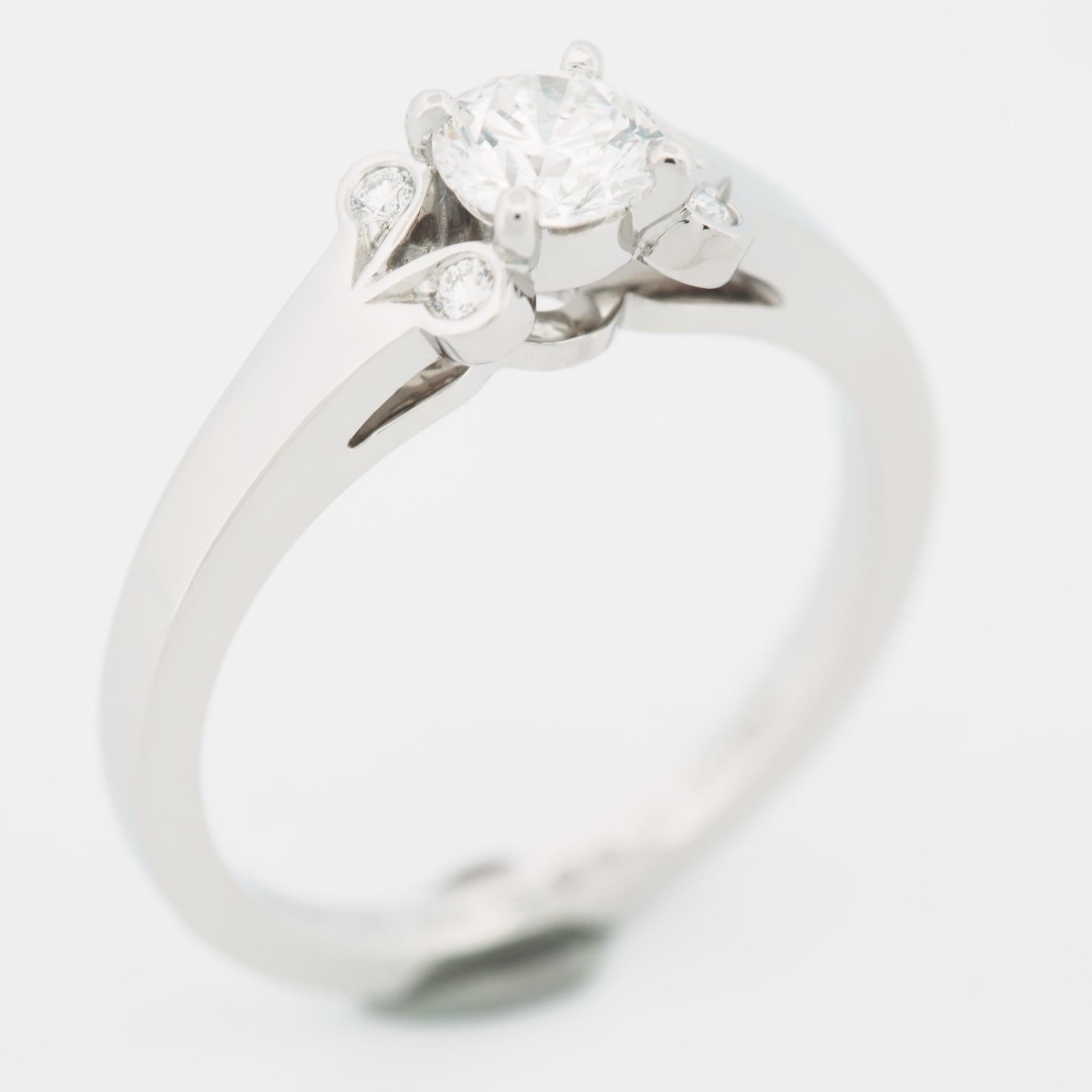 Item: Authentic Cartier Ballerine Diamond Solitaire Ring
Stones: Diamond (Center stone 0.36ct)
Color: F
Clarity: VS1
Polish: Very Good
Symmetry: Excellent
Fluorescence: None
Metal: Platinum 950
Ring Size: 49 US SIZE 4.75 UK SIZE I 3/4
Internal