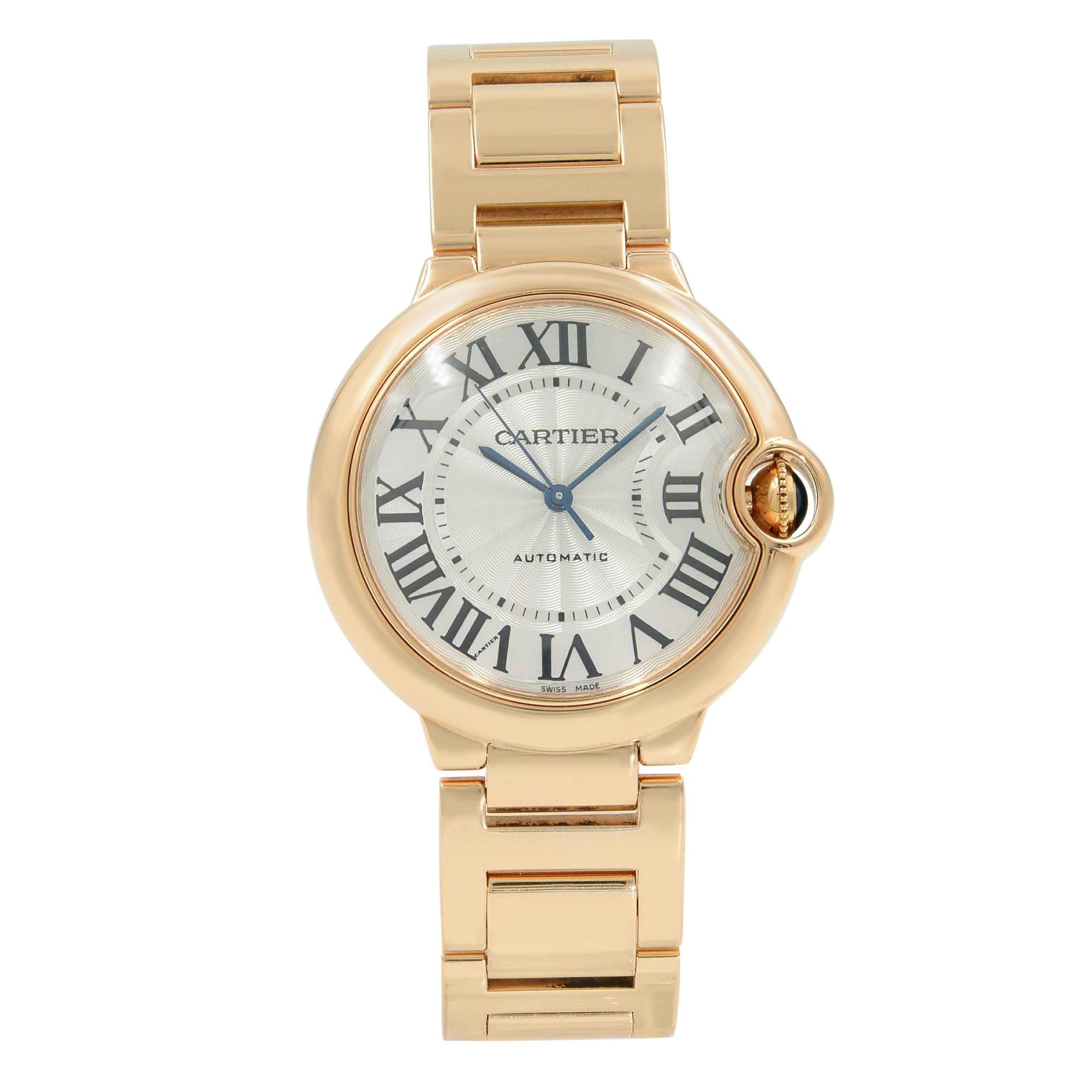 This pre-owned Cartier Ballon Bleu W69004Z2 is a beautiful Unisex timepiece that is powered by an automatic movement which is cased in a rose gold case. It has a round shape face, no features dial, and has hand roman numerals style markers. It is