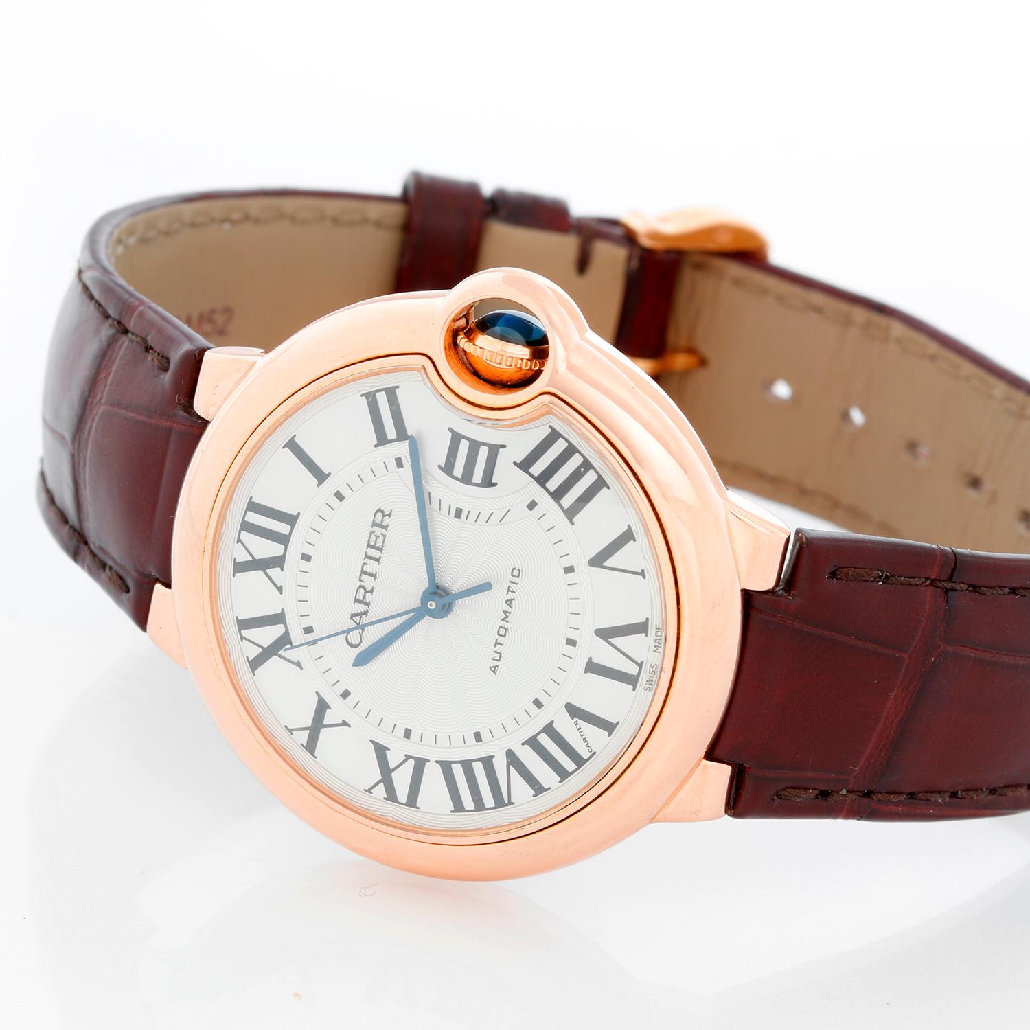 Cartier Ballon Bleu 18K Rose Gold Ladies Midsize Watch WGBB0009 - Automatic winding. 18k Rose gold  case (36 mm ). Silver guilloche dial with black Roman numerals. Brown strap. Pre-owned  with Cartier box .