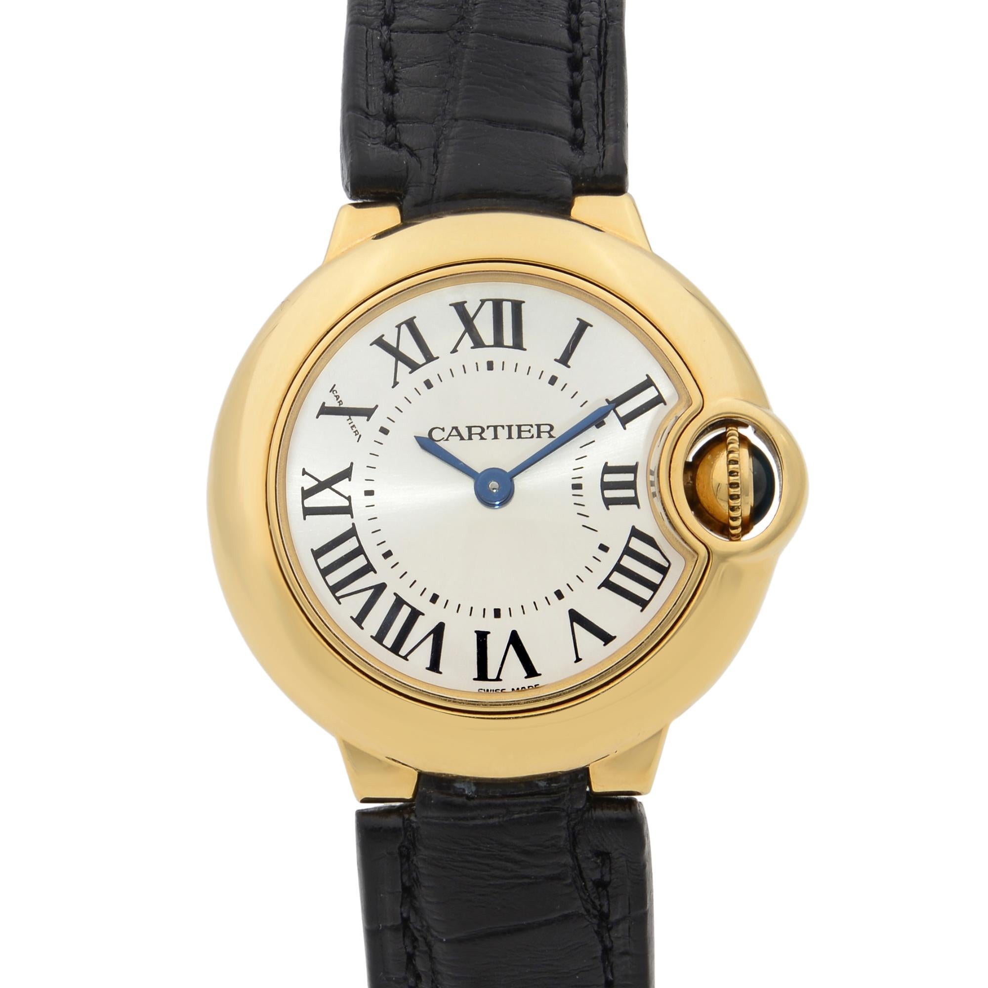 This pre-owned Cartier Ballon Bleu  W6900156 is a beautiful Ladie's timepiece that is powered by quartz (battery) movement which is cased in a yellow gold case. It has a round shape face, no features dial and has hand roman numerals style markers.