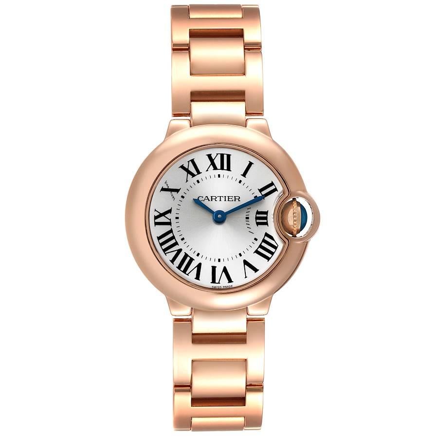 Cartier Ballon Bleu 28 Silver Dial Rose Gold Ladies Watch W69002Z2 Box Papers. Quartz movement. Caliber 057. Round 18k rose gold case 28.0 mm in diameter. Fluted crown set with the blue spinel cabochon. 18k rose gold smooth bezel. Scratch resistant