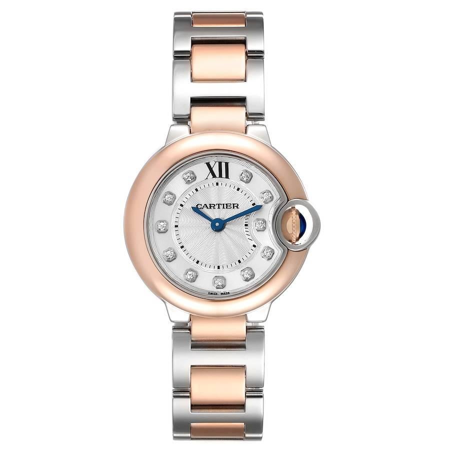 Cartier Ballon Bleu 28 Steel Rose Gold Diamond Watch W3BB0005 Box Papers. Quartz movement. Caliber 057. Round stainless steel and 18K rose gold case 28.0 mm in diameter. Case thickness: 9.35 mm. Fluted crown set with the blue sapphire cabochon. 18K